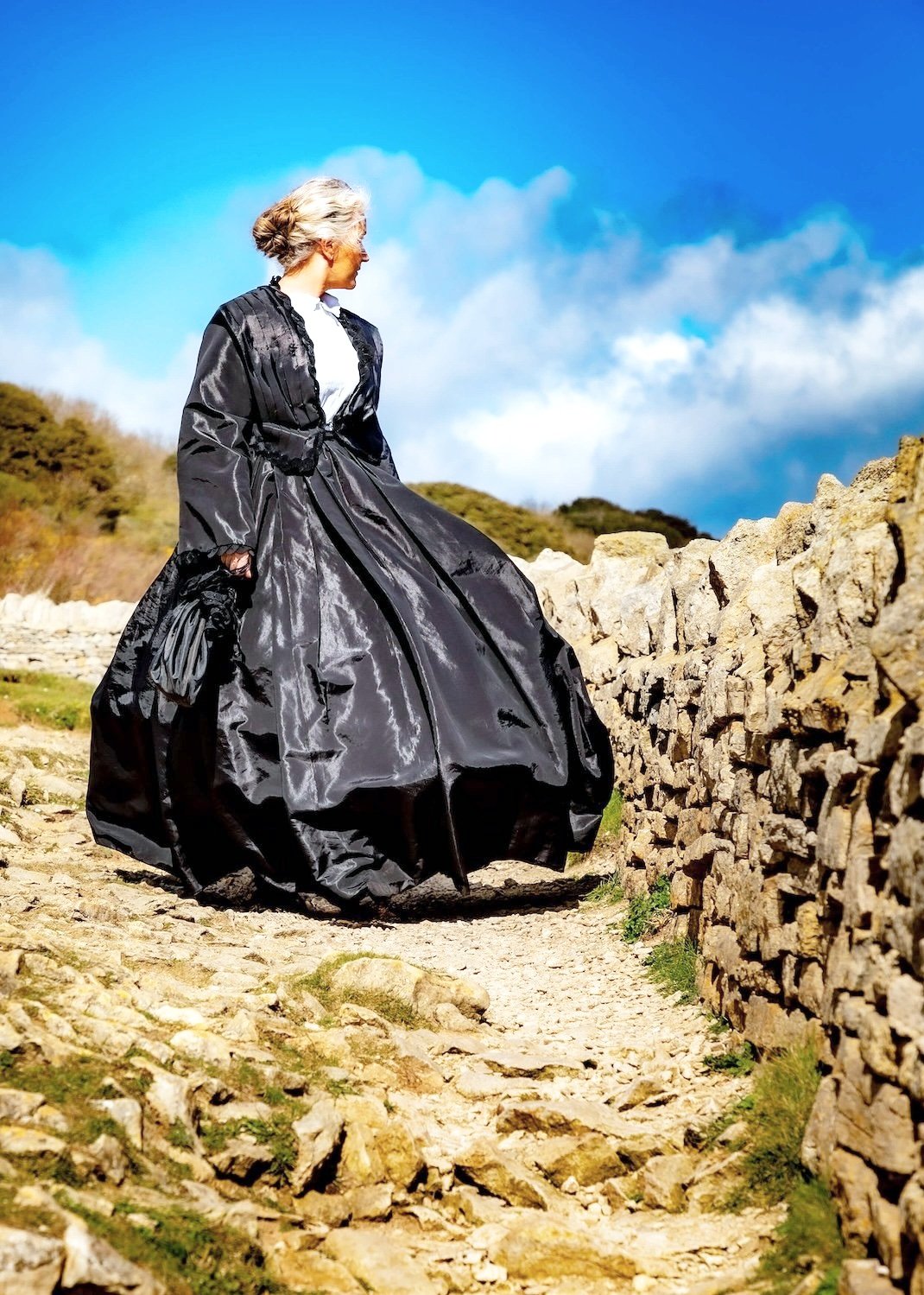 cliff+black+dress+looking+behind.jpg