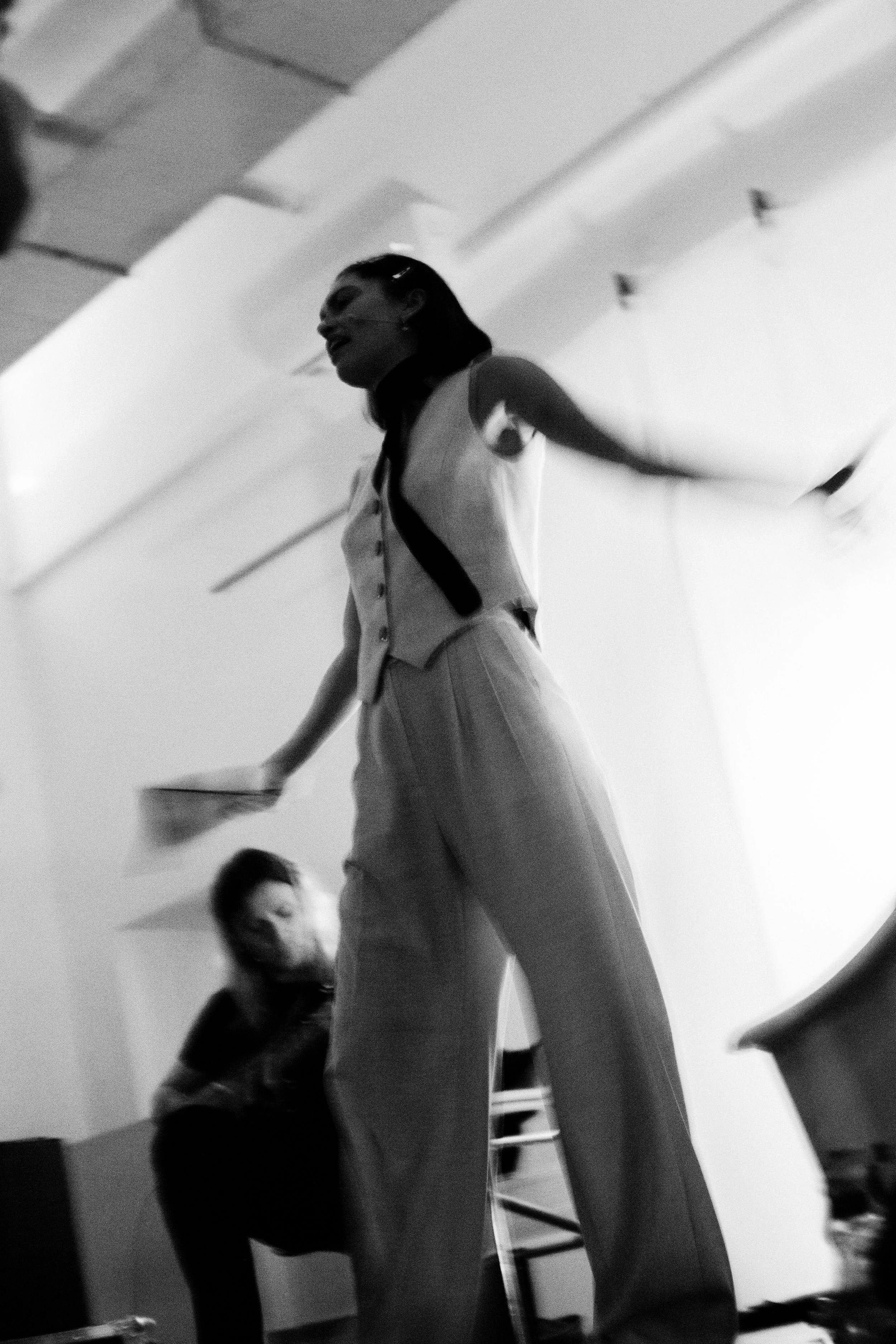 Black and white photo of  the actress Valeriia Karaman & Julien Sitruk performing a political performance at Not Allowed aka @notallowedshows 