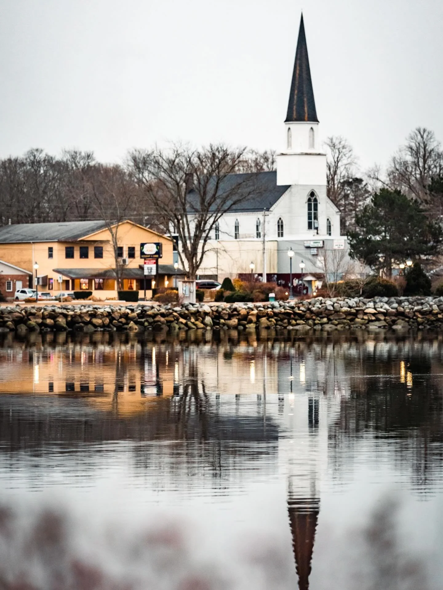 Liverpool reflections part 2. Looking across the harbour, featuring the local church, home hardware and Chinese food restaurant.