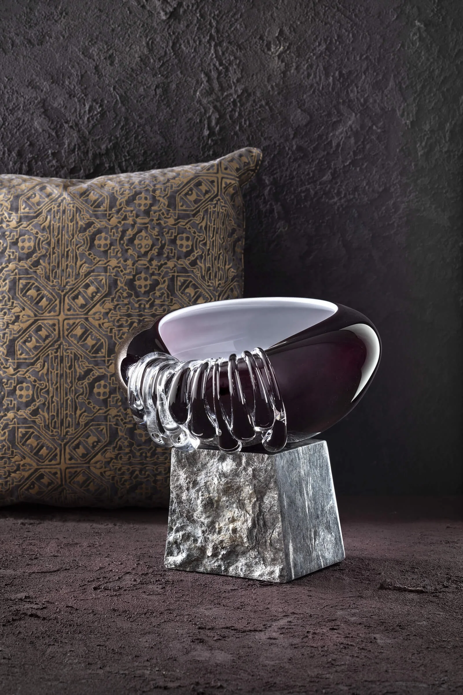 Decorative object by Aina Kari blending glass and marble