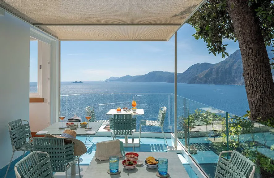 Casa Angelina hotel in Praiano overlooking the Mediterranean with minimalist white interiors