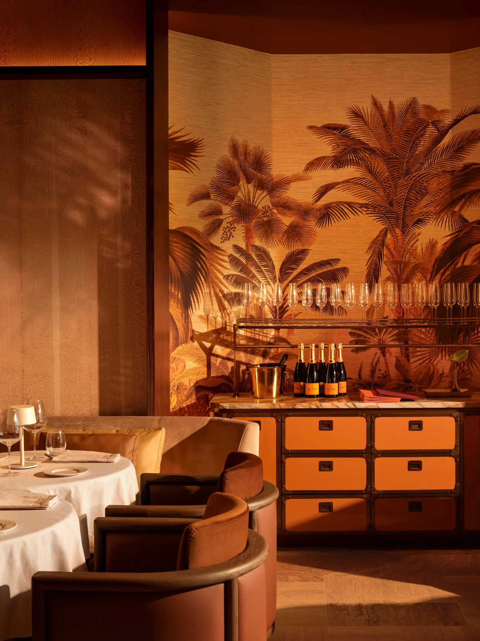 Dining space designed by URBANJOBS showing spatial rhythm and atmosphere