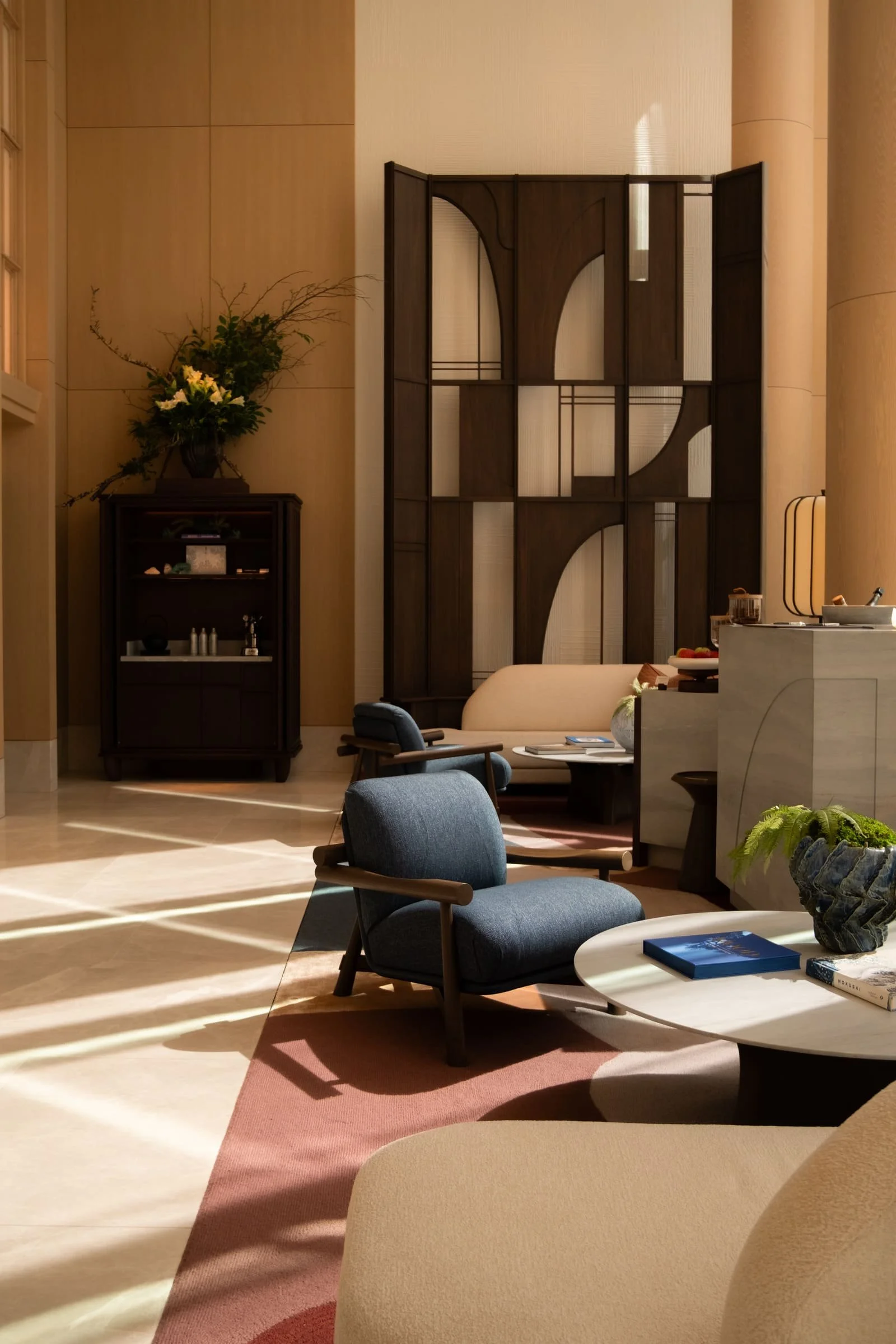 André Fu Studio interior featuring layered materials and refined detailing