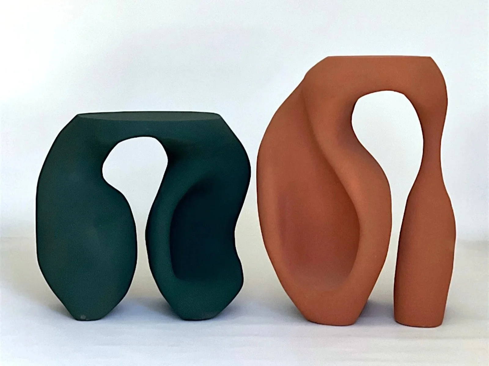 Handcrafted ceramic object with expressive silhouette