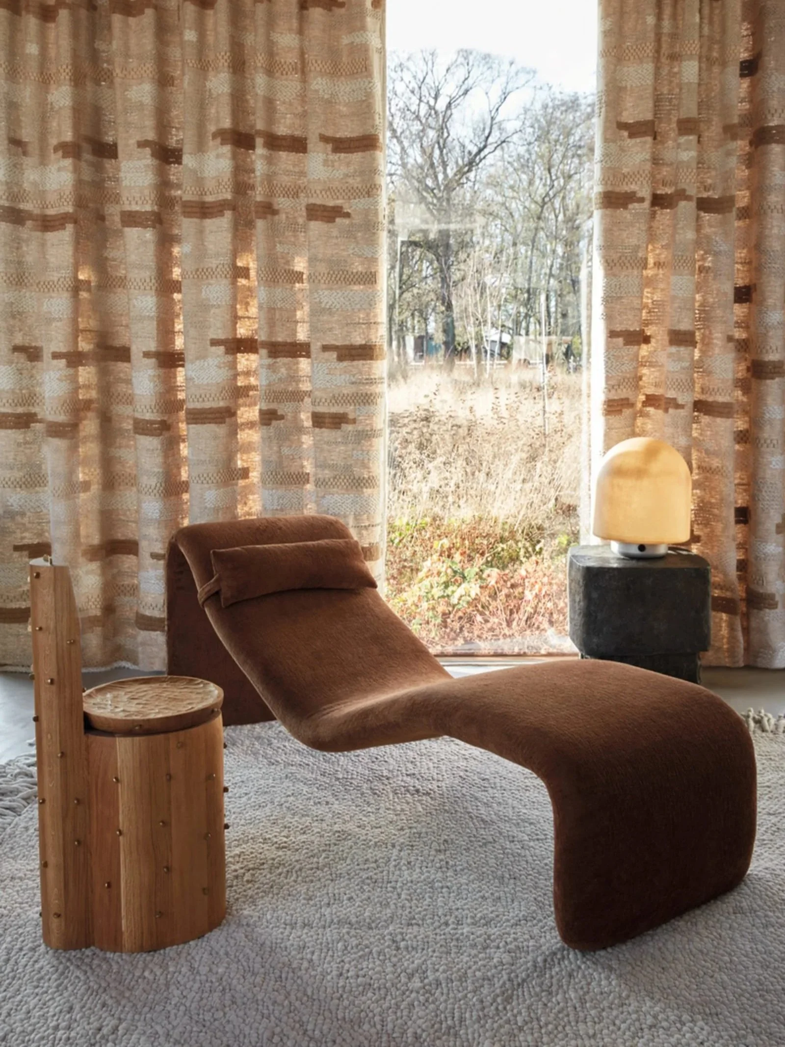 Interior space featuring Élitis wallcoverings and textiles creating a sensory, material-driven contemporary design environment