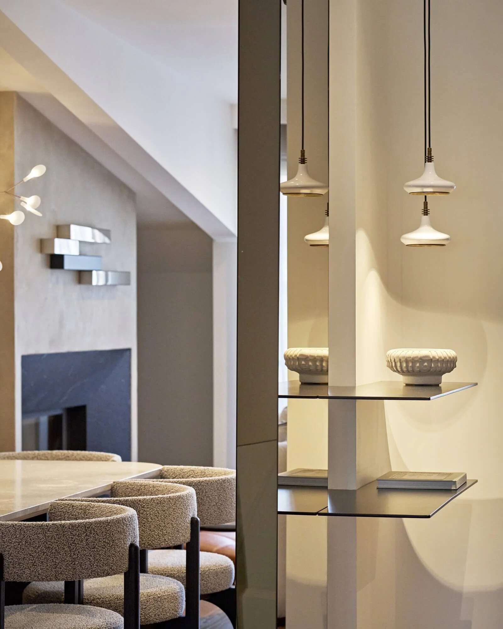 Detail of textured wall and natural materials in 21A Interiors space