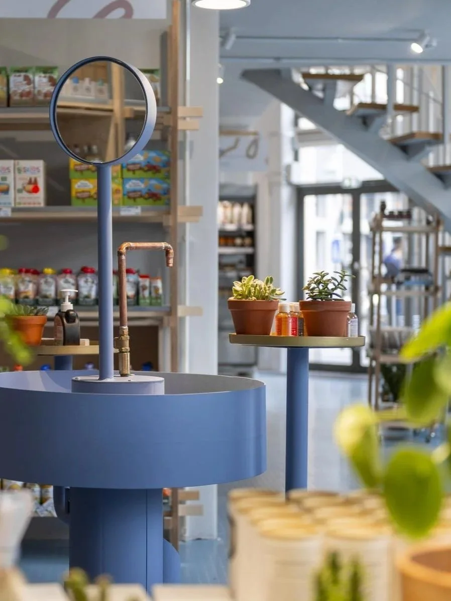 Ototo Victoriei bookstore café with shelves of books and soft lighting