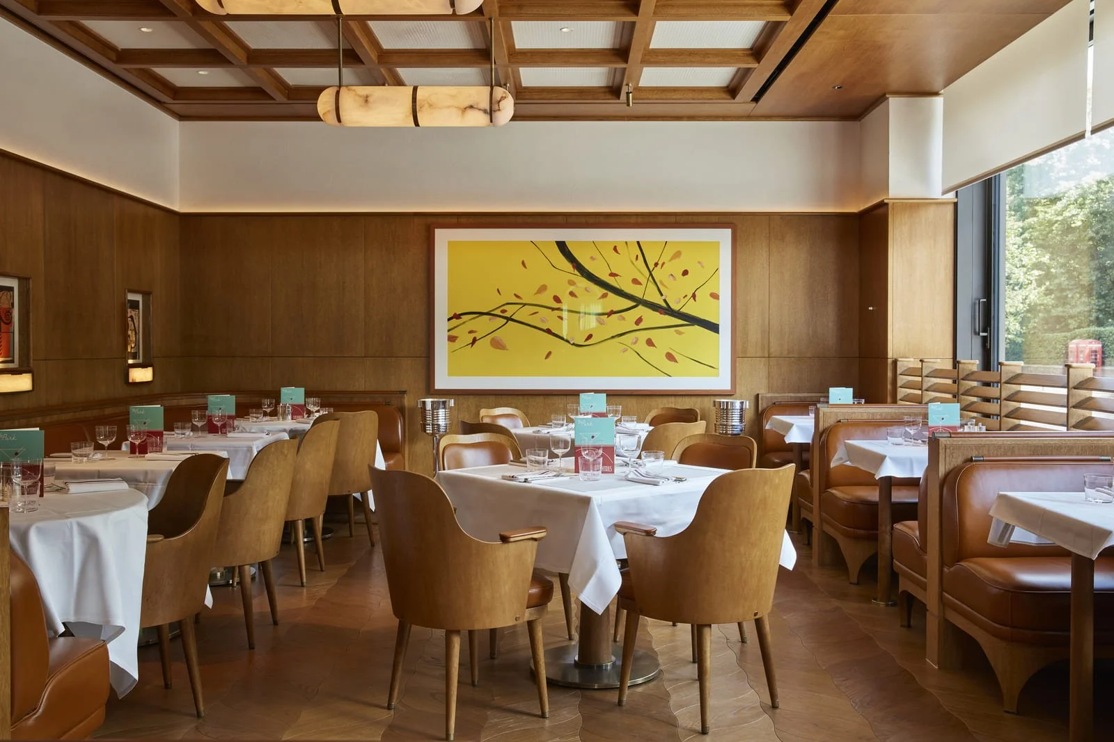 Warm wood and brass fittings give The Park's dining room its mid-century New York air
