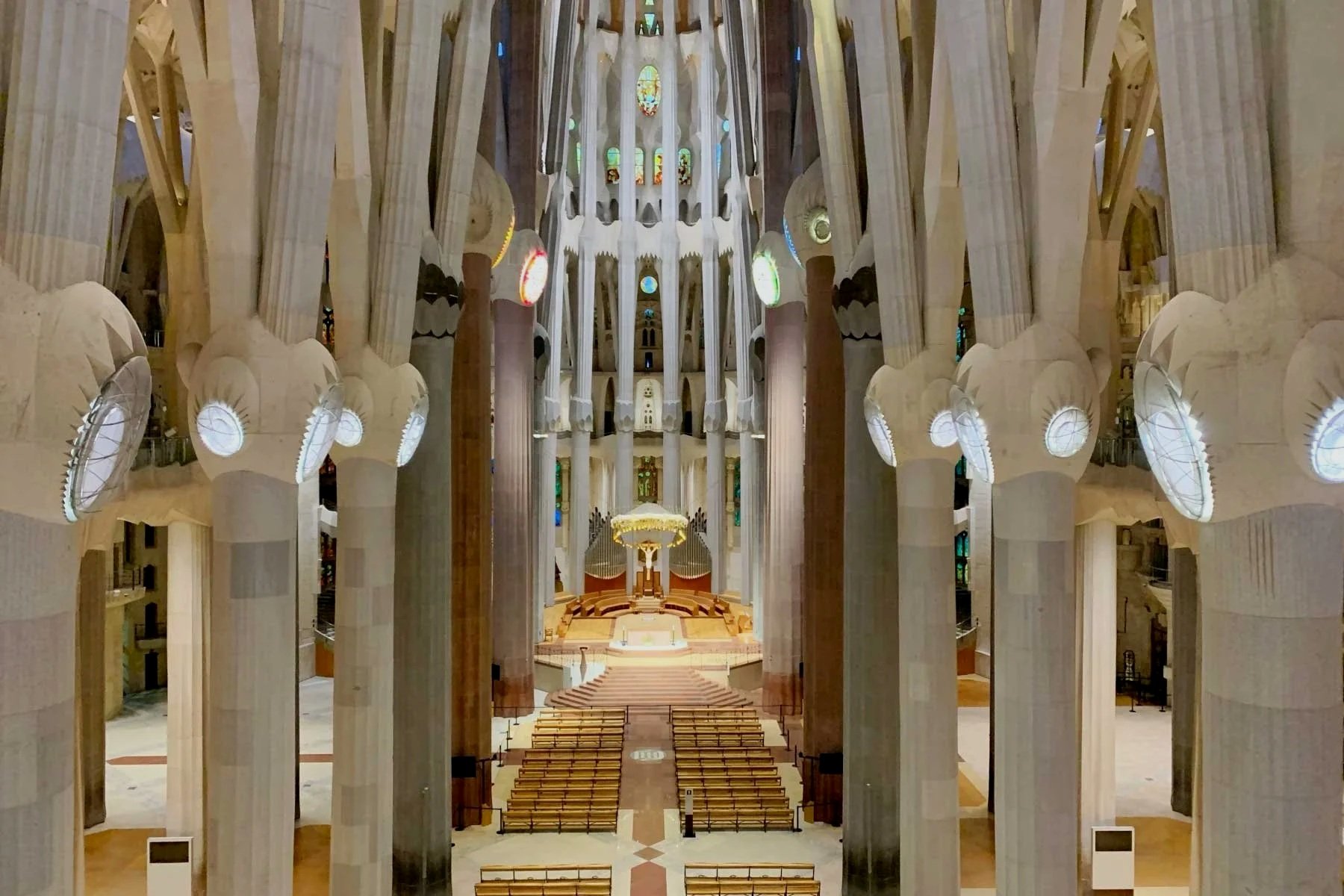 La Sagrada Família in Barcelona with Gaudí's branching columns and coloured stained-glass light
