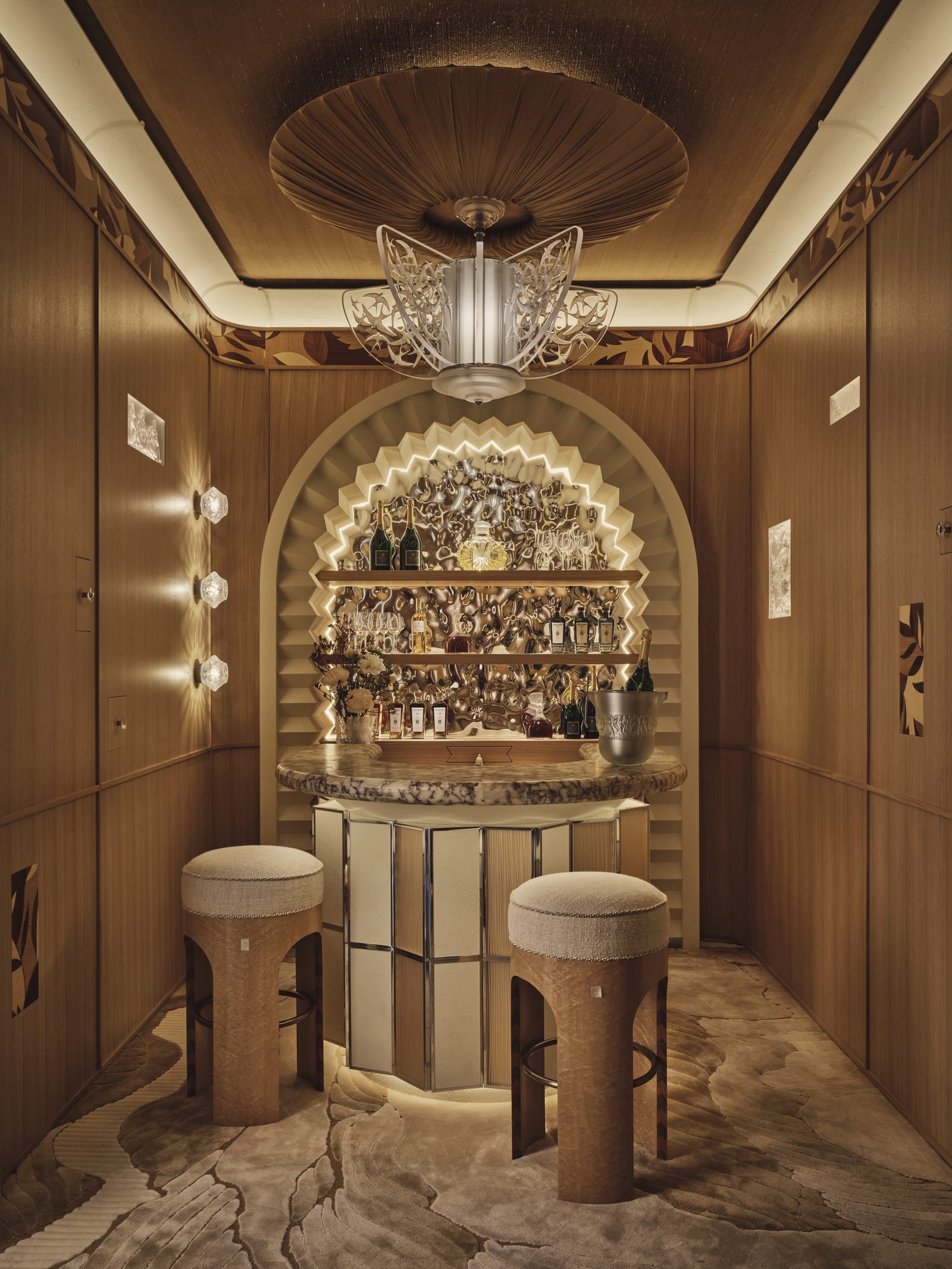 Arched joinery and crystal panels in the Lalique Home Bar by Elicyon, WOW!house 2026