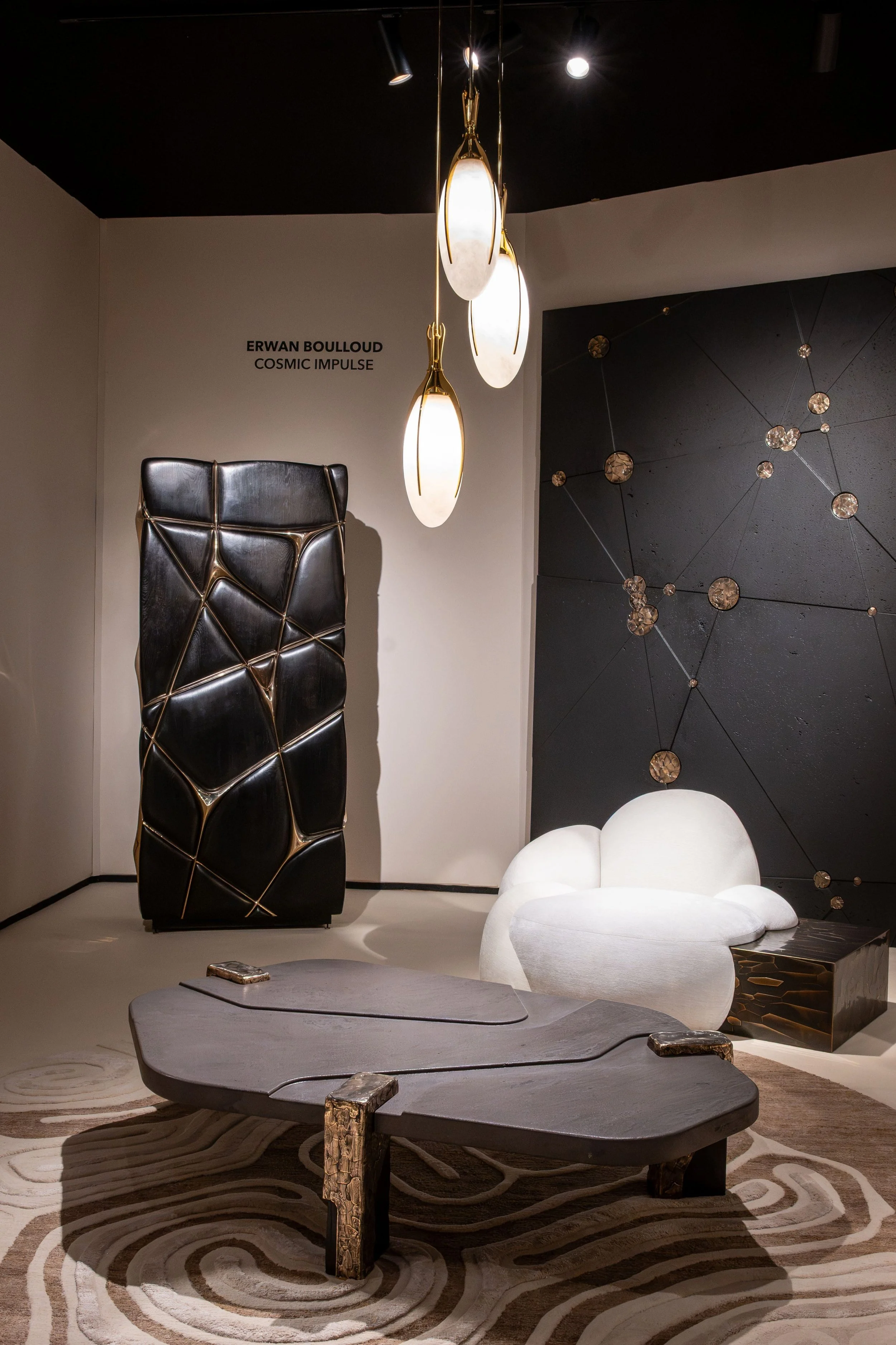 Sculptural furniture and collectible design exploring material transformation in Galerie Melissa Paul’s Cosmic Impulse exhibition.