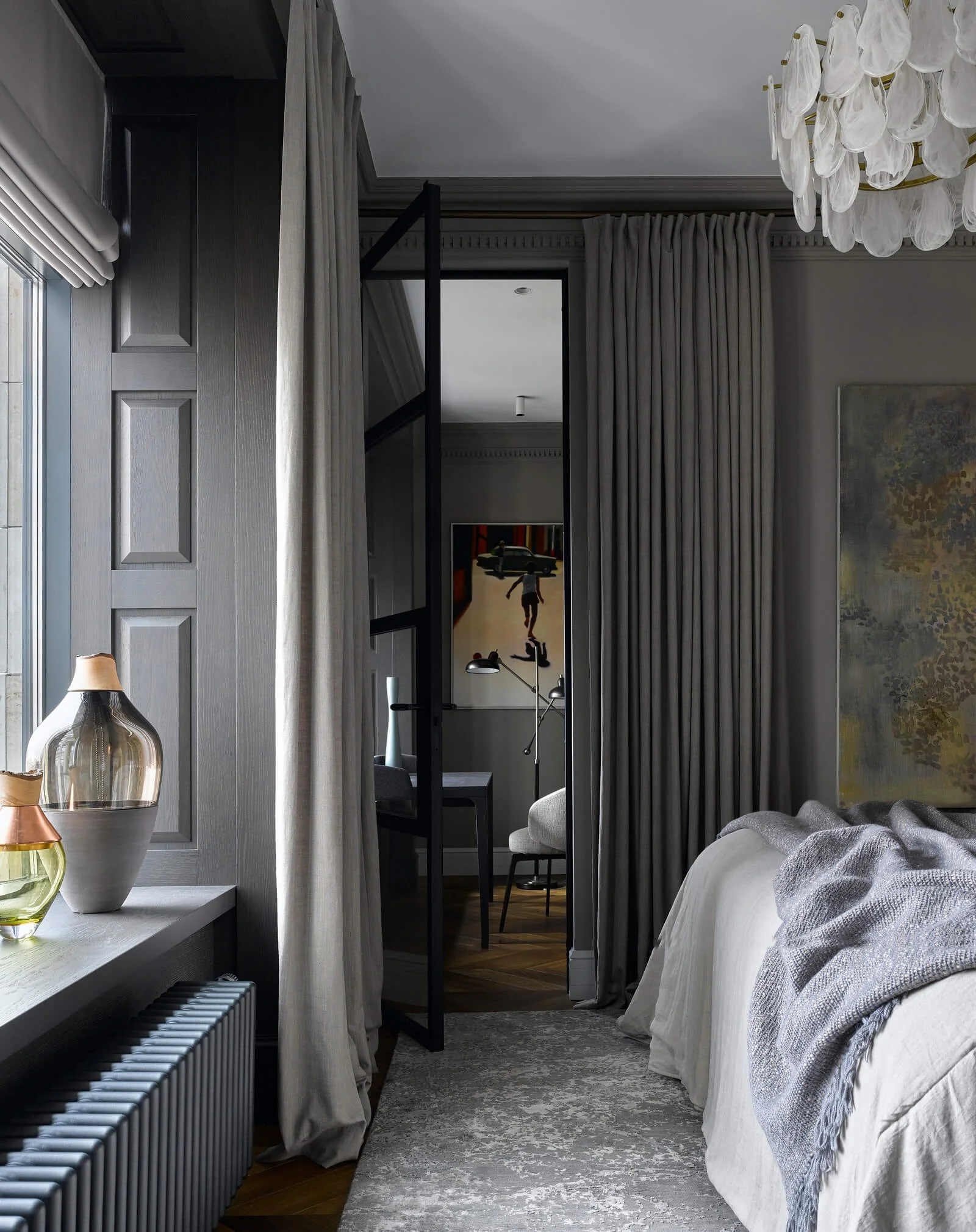 Interior with curated contemporary art and sculptural furniture