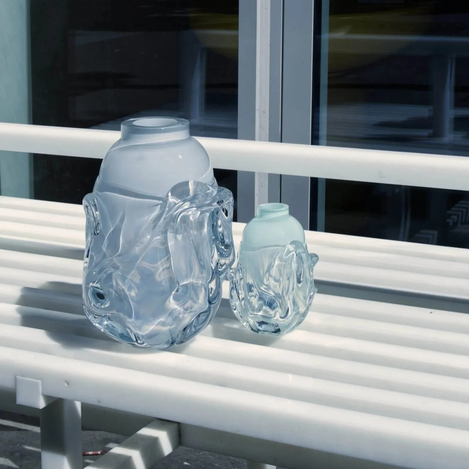 Sculptural glass object shaped by gravity and heat