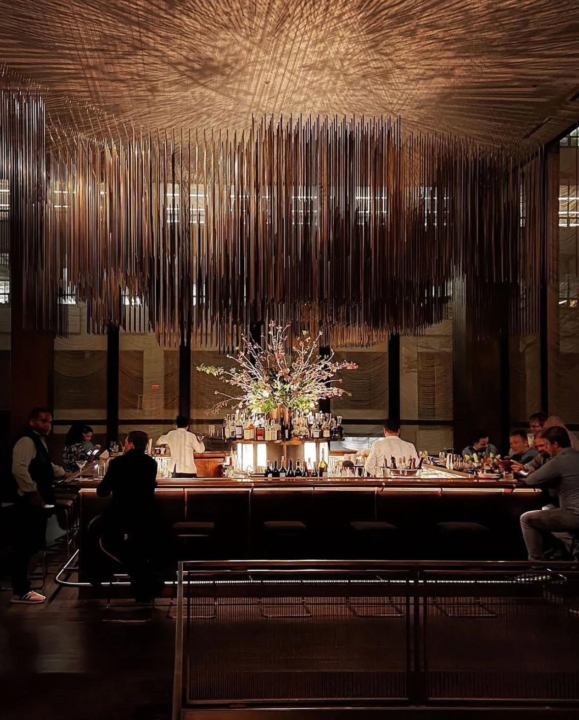 The Grill's mid-century modern dining room in the Seagram Building, New York, with bronze ceiling and travertine walls