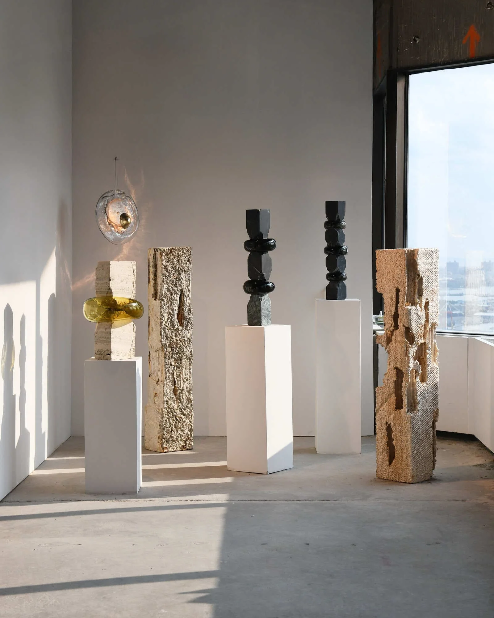 Geological inspired sculpture by Edoardo Cozzani featuring glass and aluminium