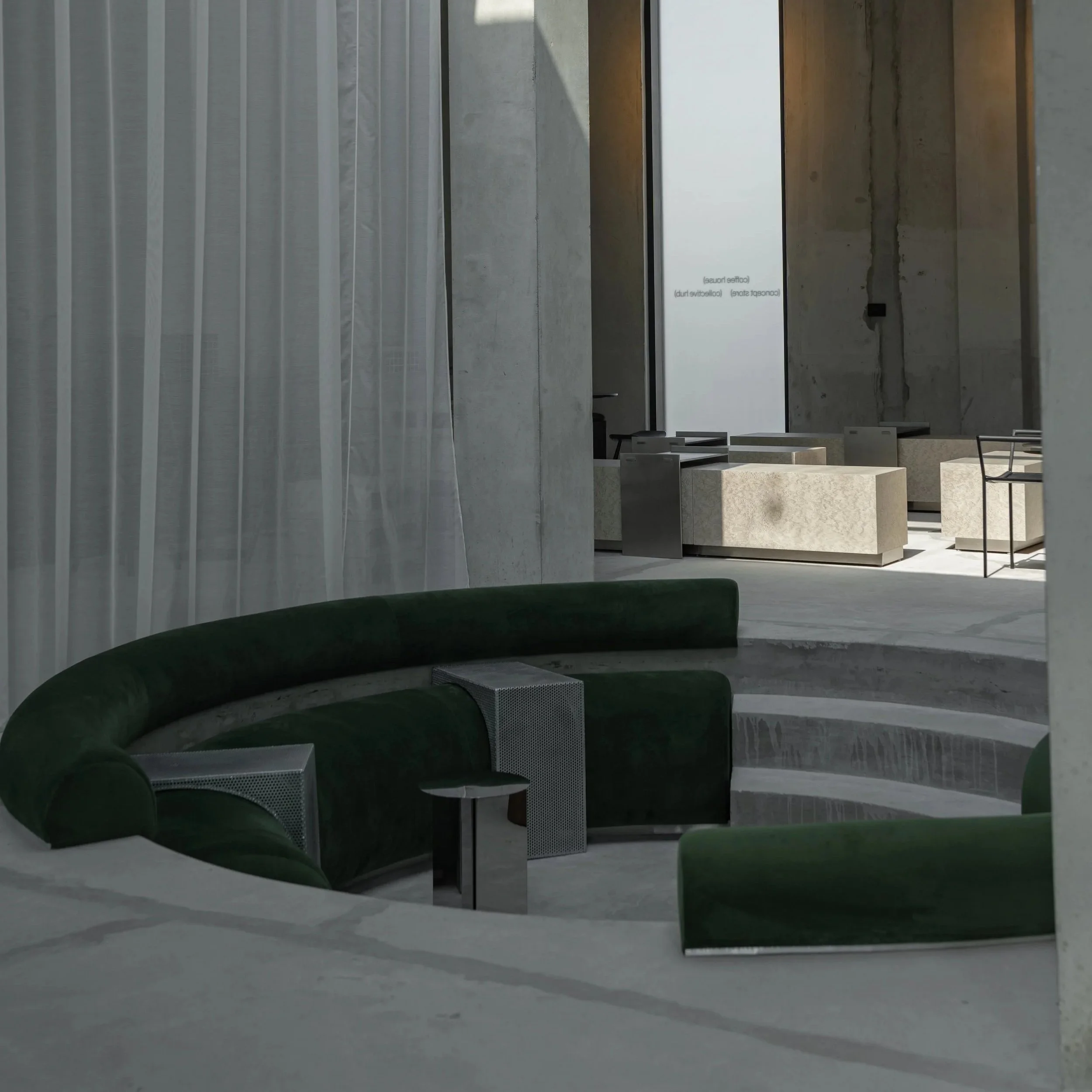 Brutalist café interior with exposed concrete and geometric forms