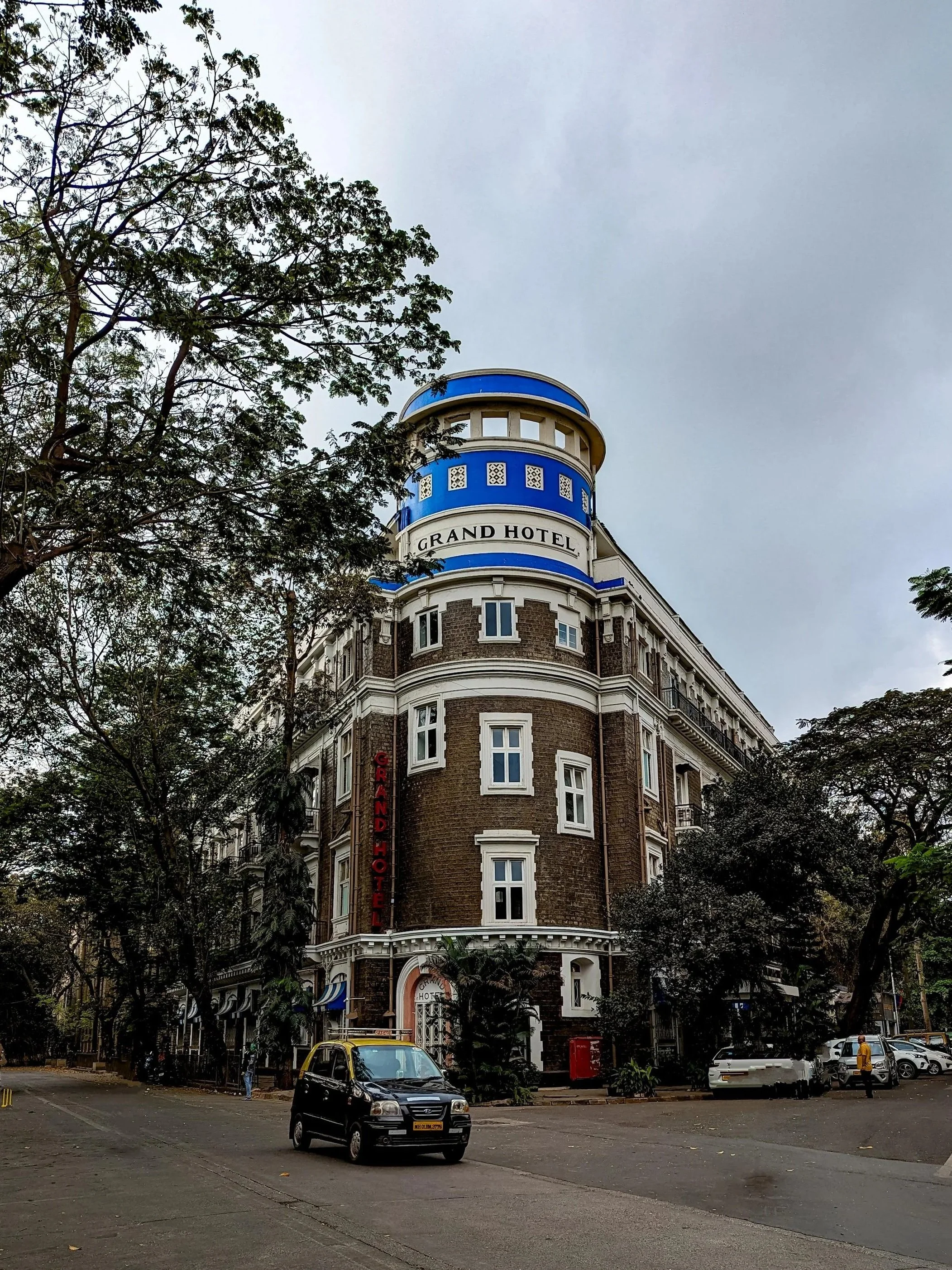 Vintage furniture and collectible objects at Mahendra Doshi Antiques in Mumbai.