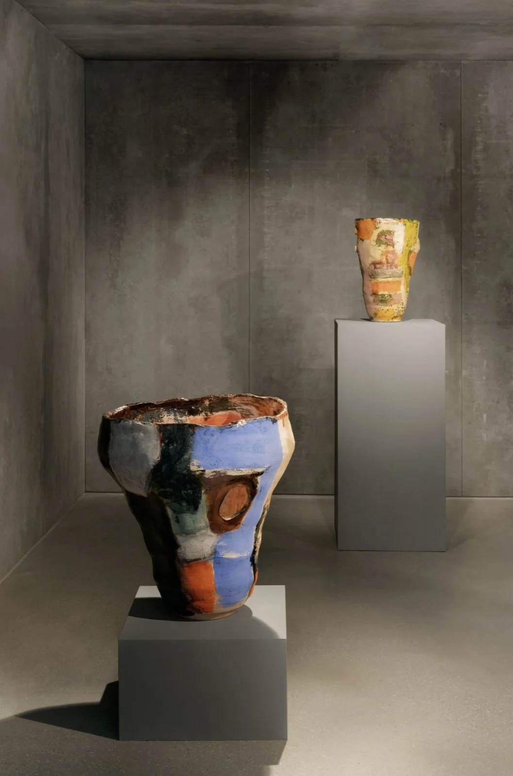 Functional art and collectible design pieces in Carpenters Workshop Gallery Paris with dramatic lighting and architectural setting