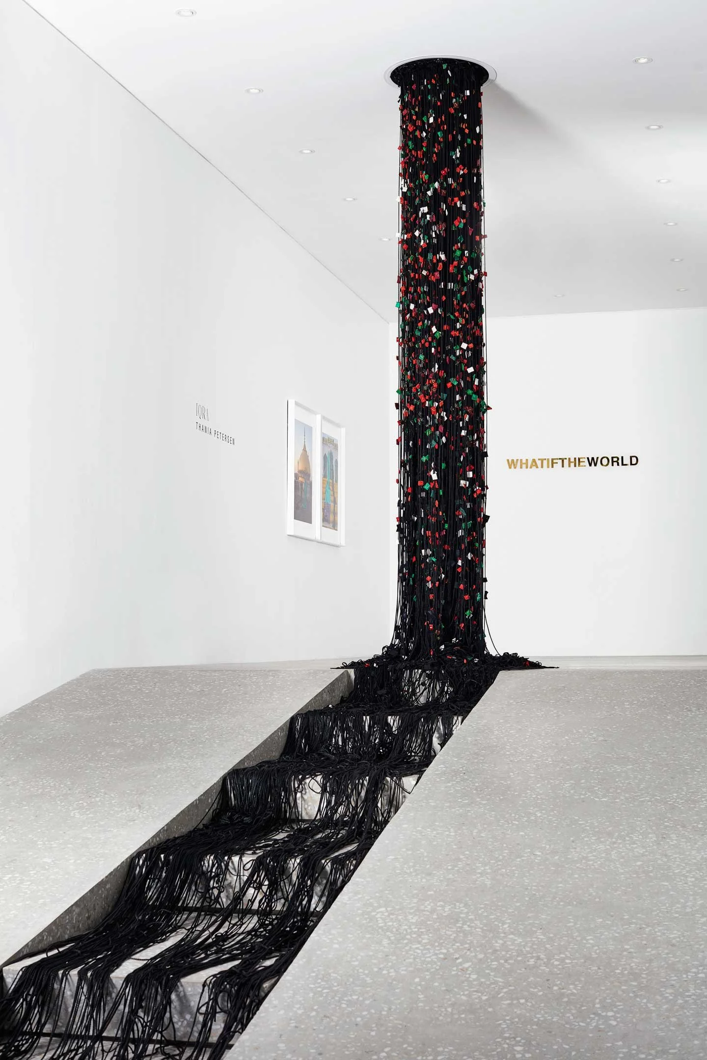 Minimal gallery space at WHATIFTHEWORLD featuring contemporary African artworks