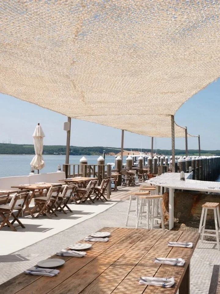 Duryea's waterfront restaurant terrace overlooking Fort Pond Bay in Montauk, The Hamptons