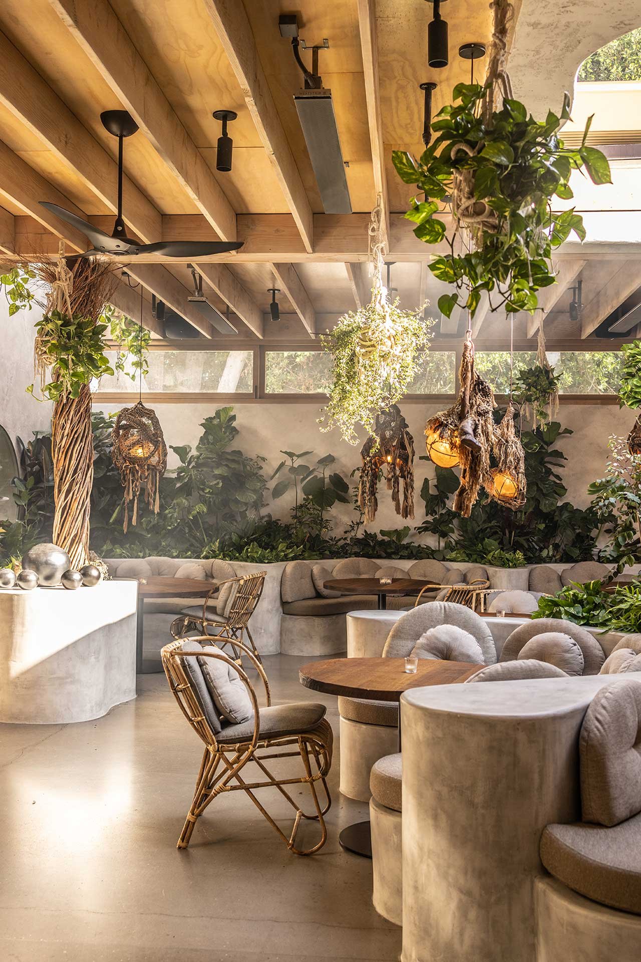 Sculptural earth-toned interior of Meteora restaurant in Los Angeles