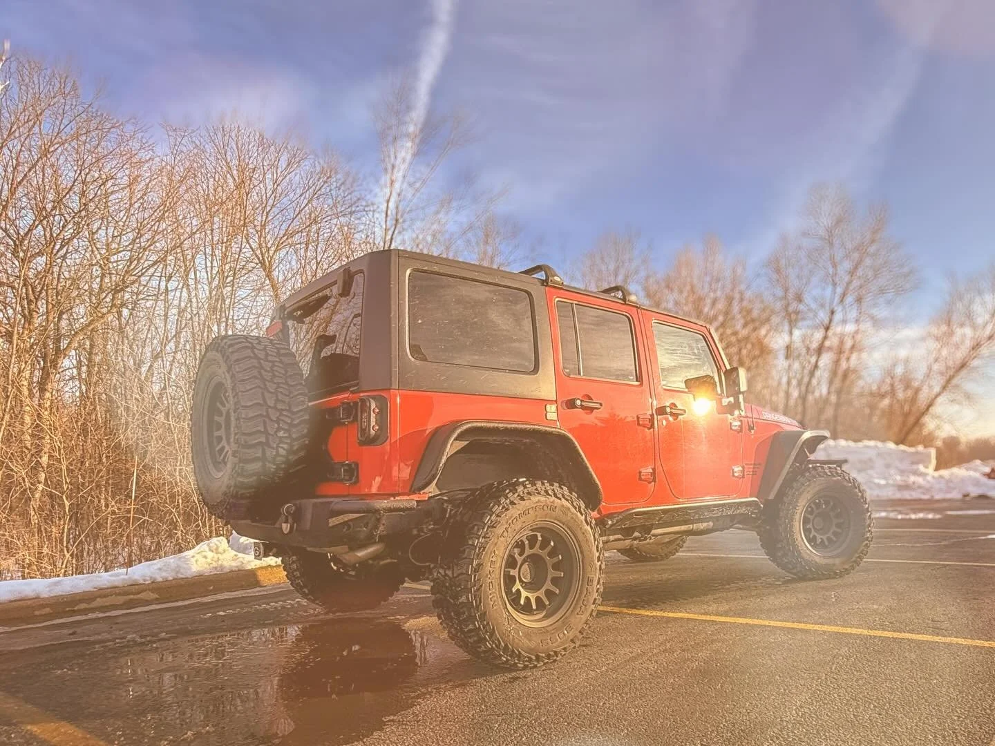 **Tushy Tuesday Before Christmas**

On Tushy Tuesday, as Christmas draws near, 
Jeeps rumble gently, spreading good cheer. 
Snowflakes are dancing, blanketing the ground, 
Adventure awaits, oh the joy to be found! 

With lift kits and tires so rugged
