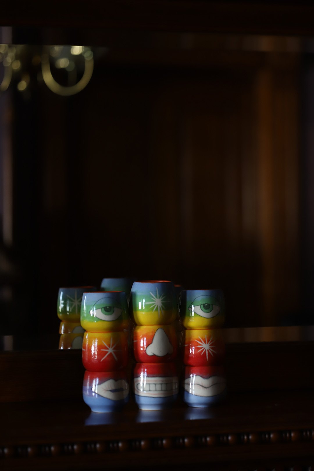 rainbow face stack in front of mirror.jpg