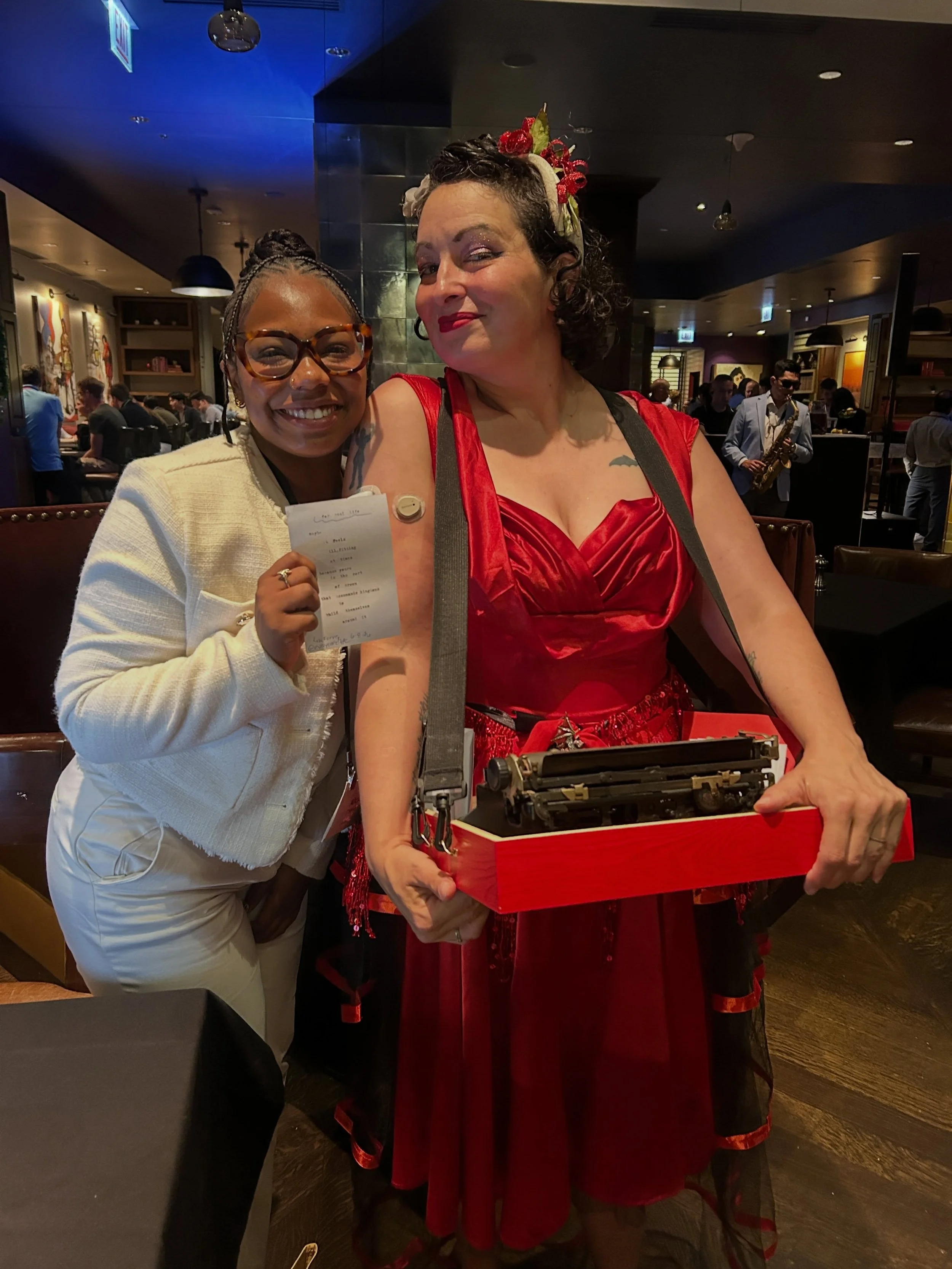 Have you ever heard of a strolling typewriter poet? 

Brought my Poems to Go strolling typewriter service to a corporate mixer on Monday. It was so much fun to flounce around and offer impromptu poems. I met some really amazing people. 

Want strolli