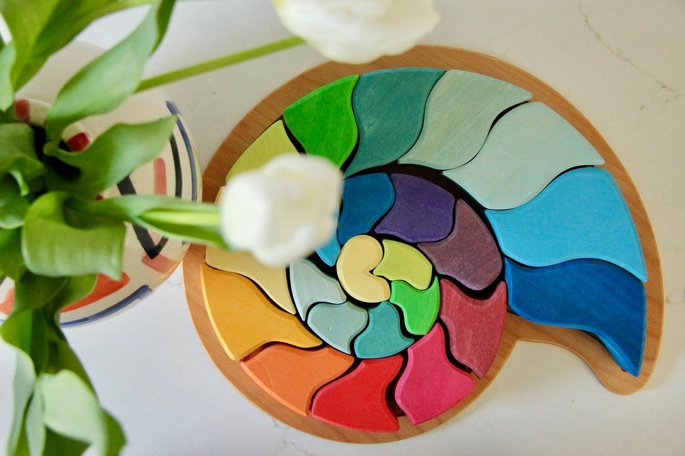 Where a rainbow becomes a bridge and a snail, a puzzle. @grimmswoodentoys toys blur the lines between art and play, inviting little hands to imagine without limits. Crafted from natural wood, each piece is a tool for open ended play. Discover some of