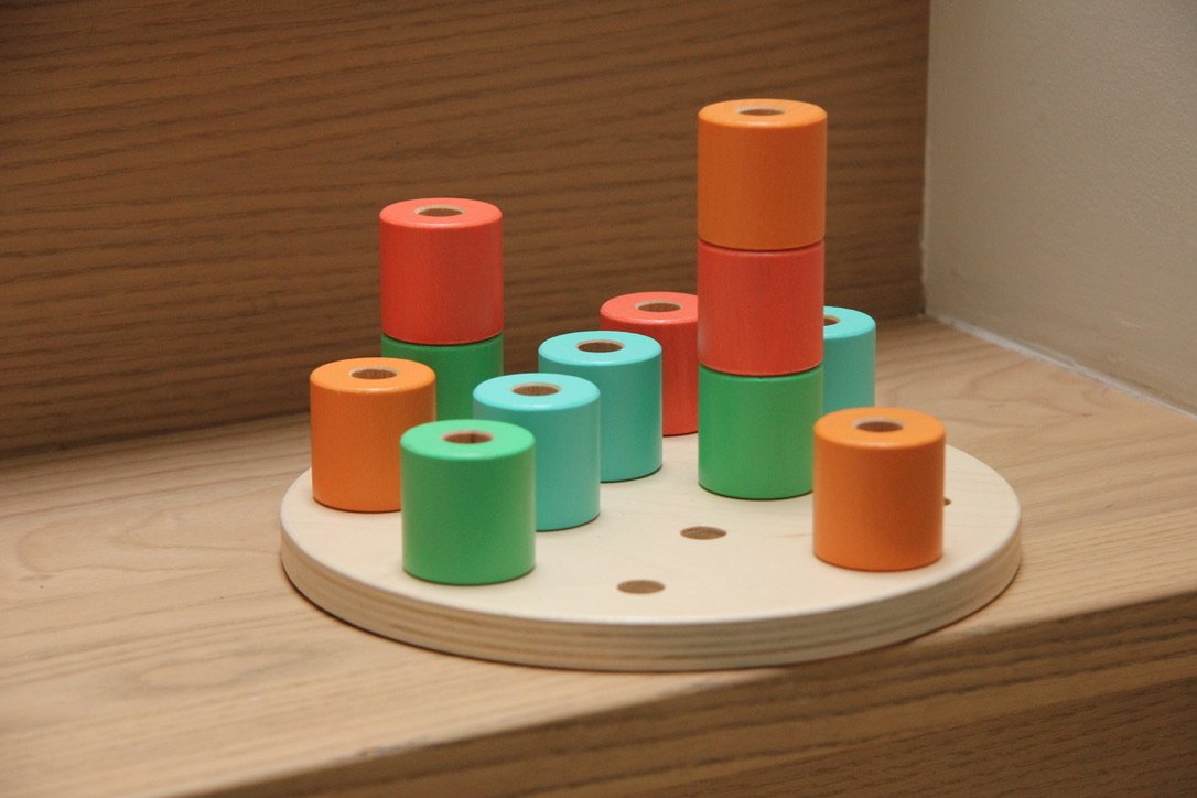 Wooden Stacking Pegboard - Lovevery 2.jpeg