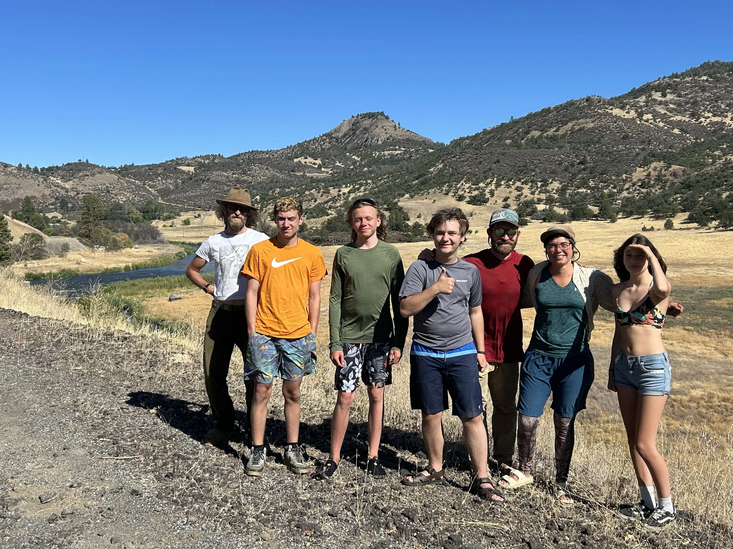 Participants in the end of summer Earth Right Adventure Camp hike at the former Iron Gate reservoir lakebed