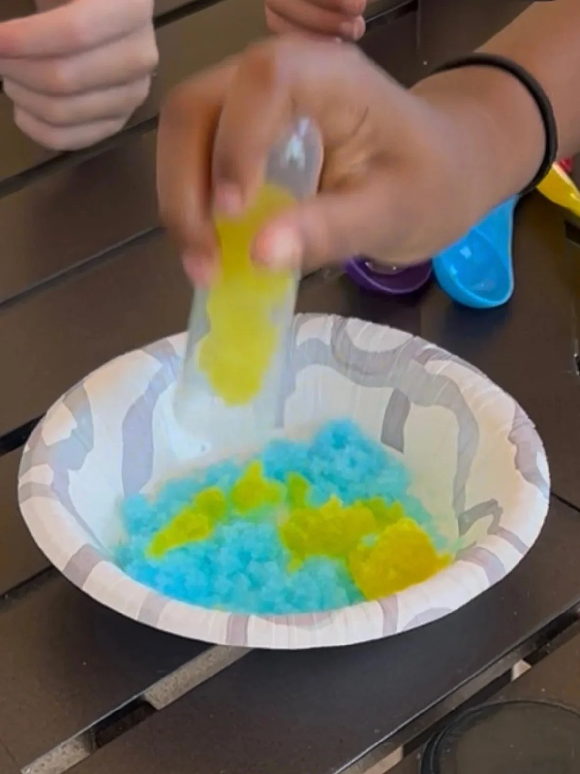 Photo of kids making artificial snow