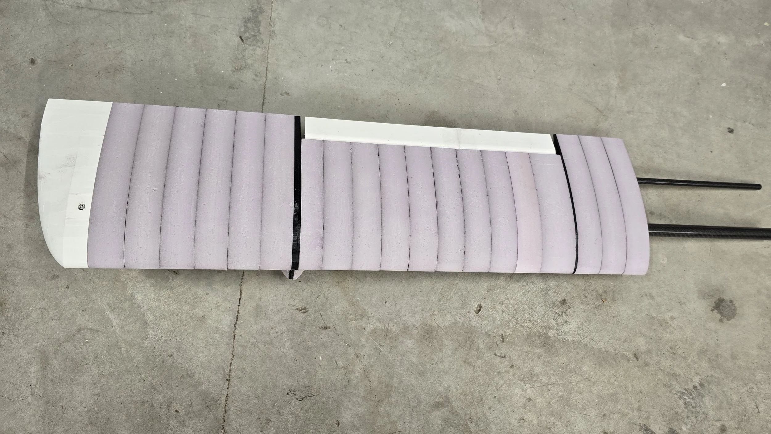 Wing section with CNC cut cross-sections and carbon fiber wing spar