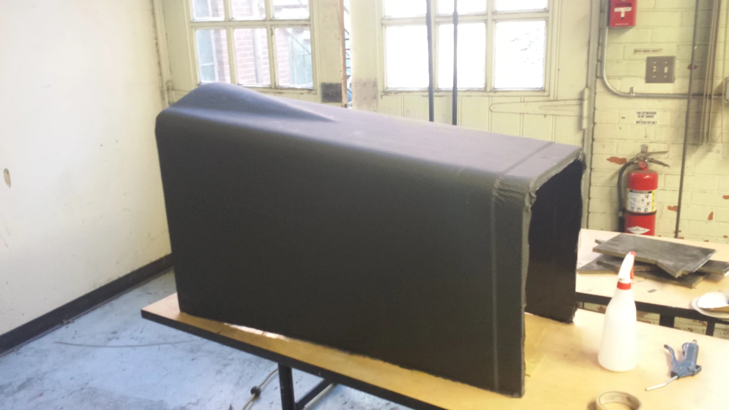 Carbon fiber body piece after removal from the mold