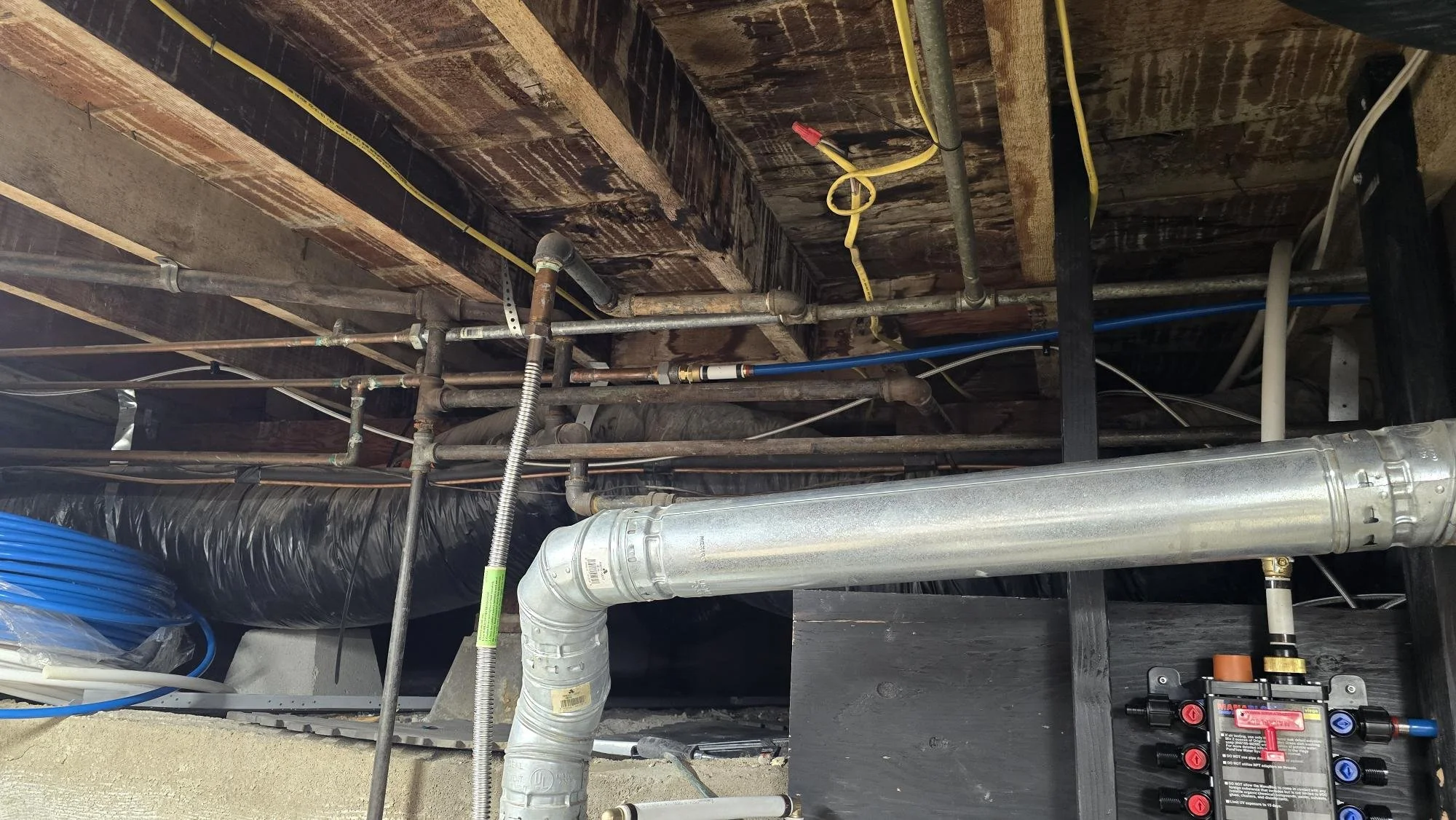 Original mixed galvanized, copper, and PEX plumbing