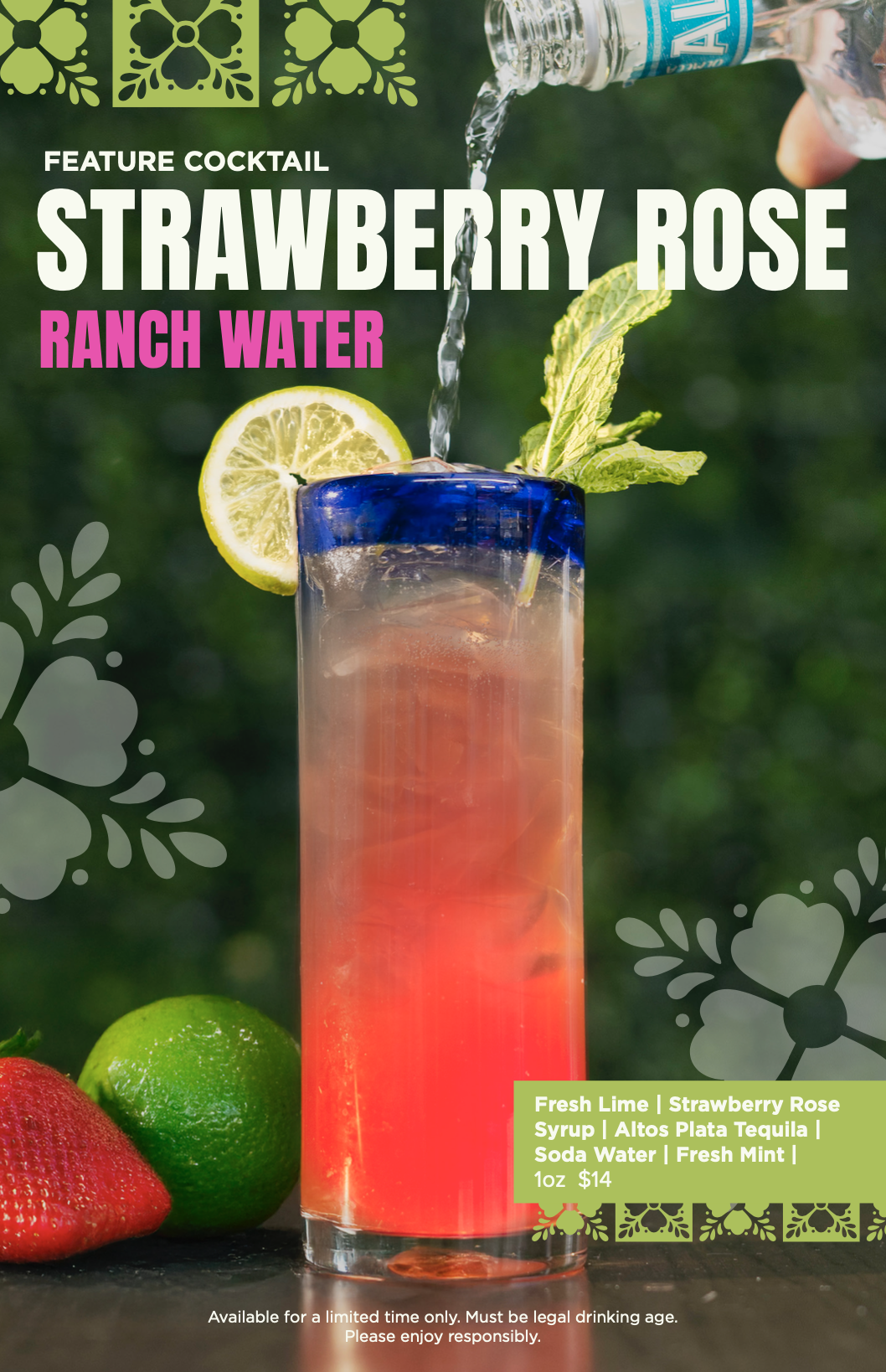 A tall glass containing a pinkish-red strawberry rose ranch water cocktail, garnished with a lemon wedge and a sprig of mint, with a bottle pouring sparkling water into it. Fresh strawberries and a lime sit beside the glass, with decorative green floral patterns and text listing ingredients in the background.