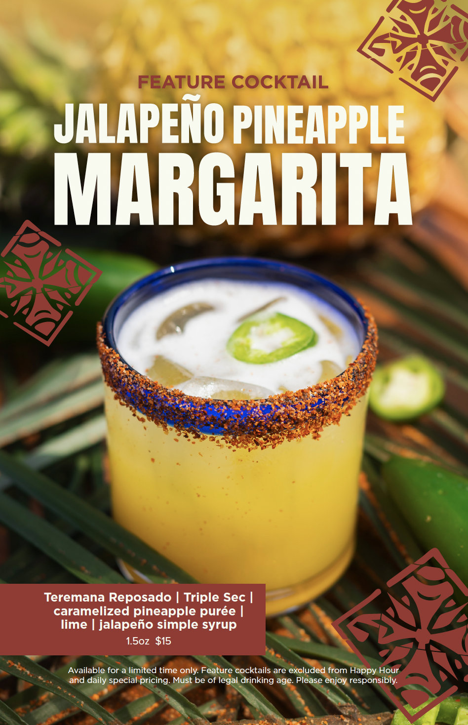 A yellow cocktail with a salted rim, garnished with a slice of jalapeño, inside a glass with a blue rim, served on a tropical background with pineapple leaves and sliced jalapeños.