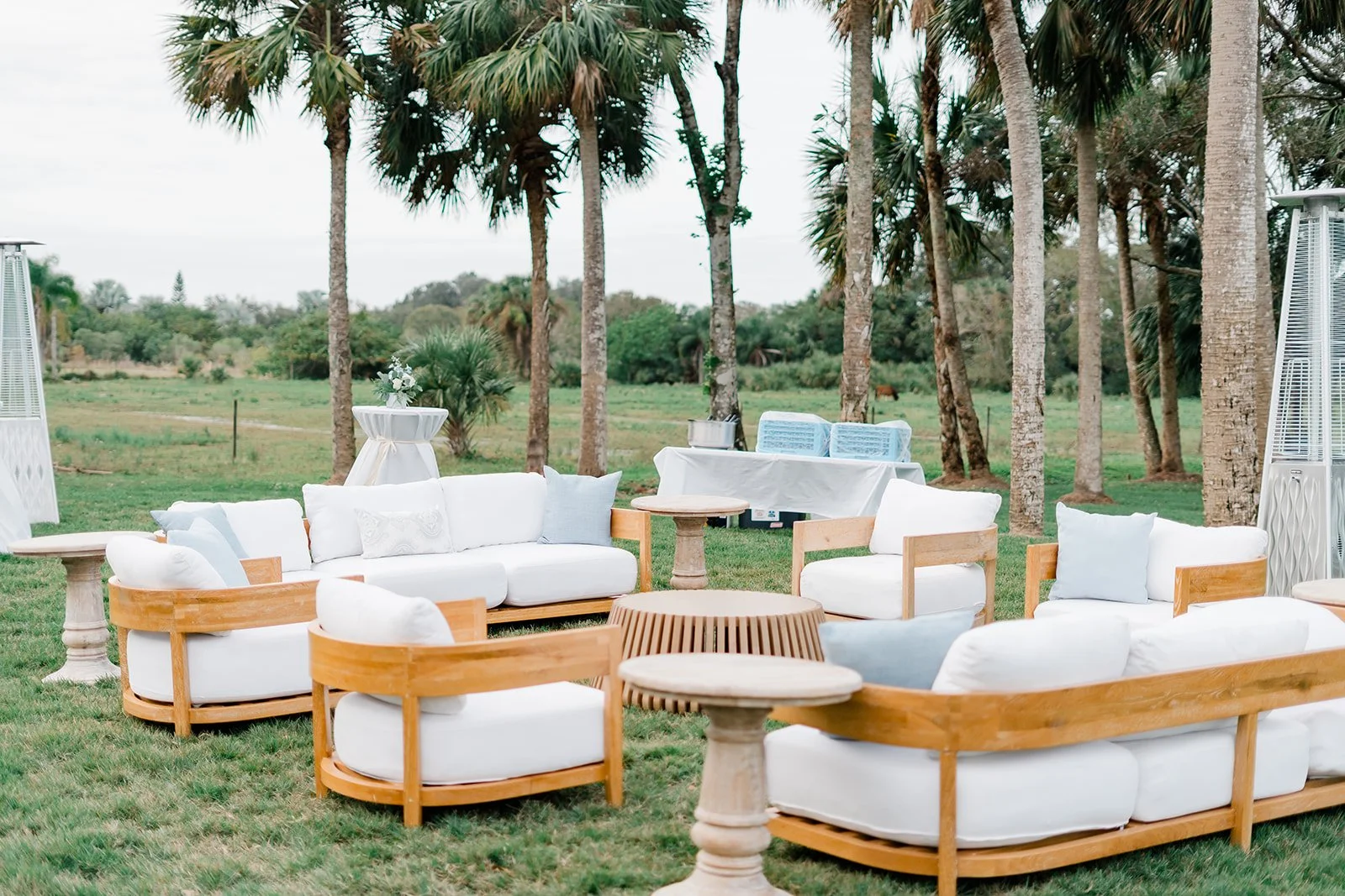 Expansive manicured lawn at Celebration Grove in Vero Beach, set under oak trees and rustic natural beauty, perfect for outdoor weddings and custom event décor.