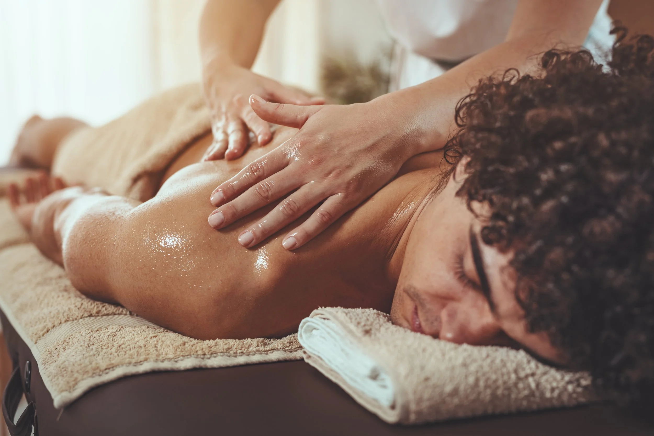 A man getting a therapeutic massage.