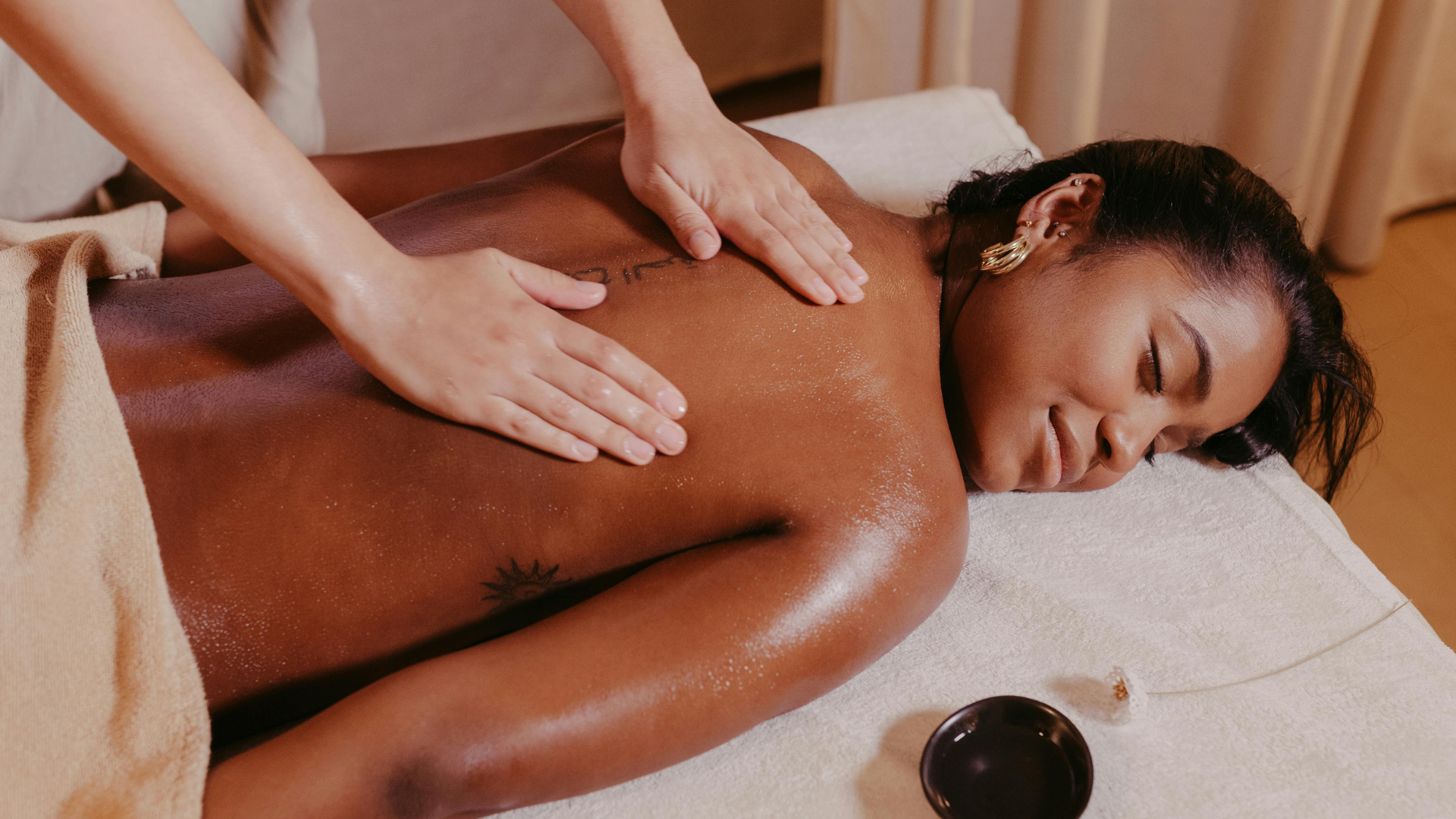 A woman receiving a relaxing massage near Hadley, Massachusetts.