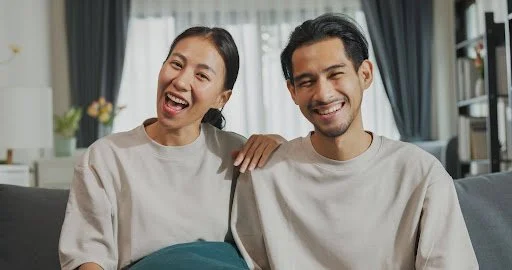 A couple wearing comfortable clothes for a massage.