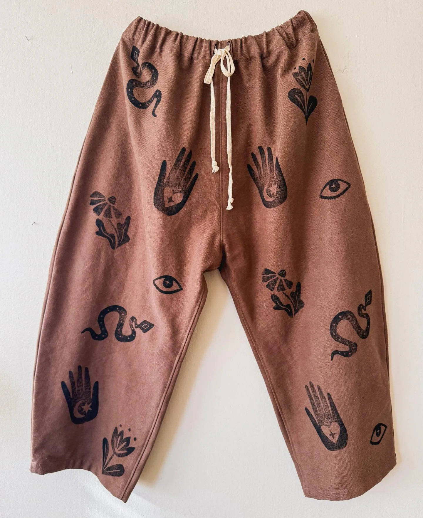 COMING SOON 🤎🦌

A small collection of one-of-a-kind block printed and painted Dance Pants, boxy tops and maybe a few other things is in the works!
 
Mark your calendars for a small ready-to-ship shop update happening at 9am pt on December 12th! A p