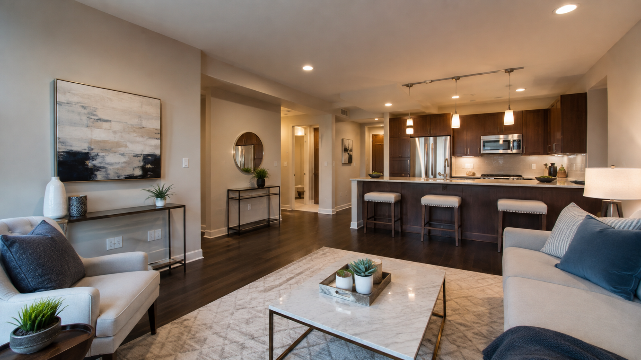A Chicago home staged for sale with professional lighting and a modern kitchen visible through an open floor plan, representing a well-prepared listing.