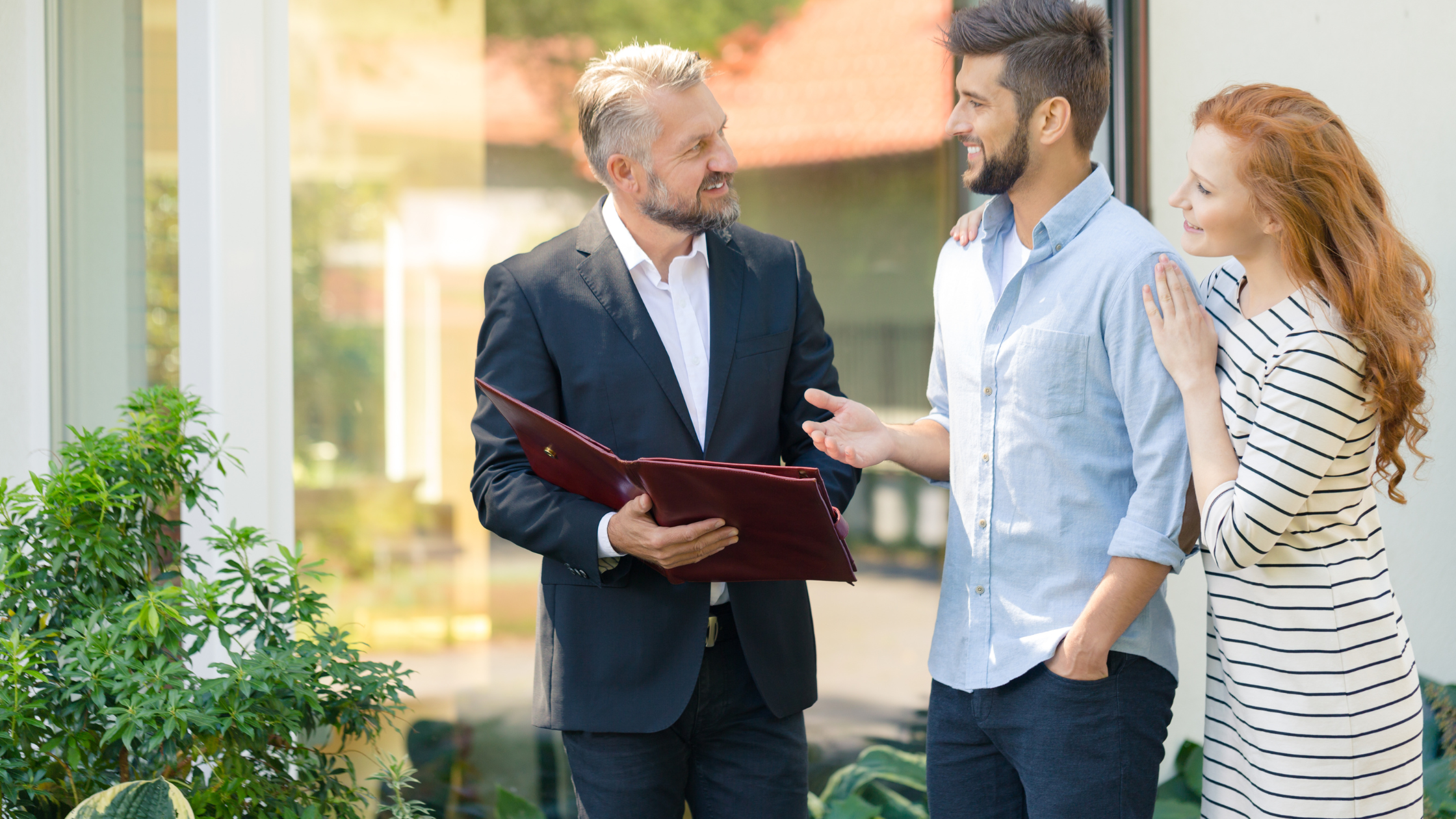 Real estate agent reviewing a home estimate with sellers