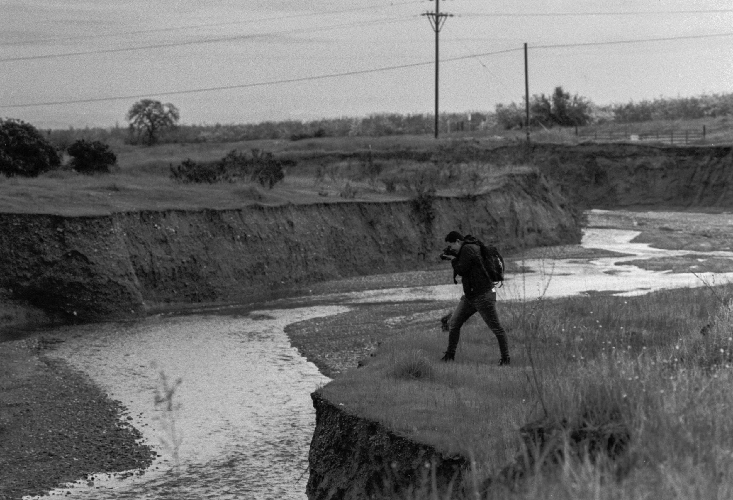 A lone photographer photographs Sand Creek in Arbuckle, California
