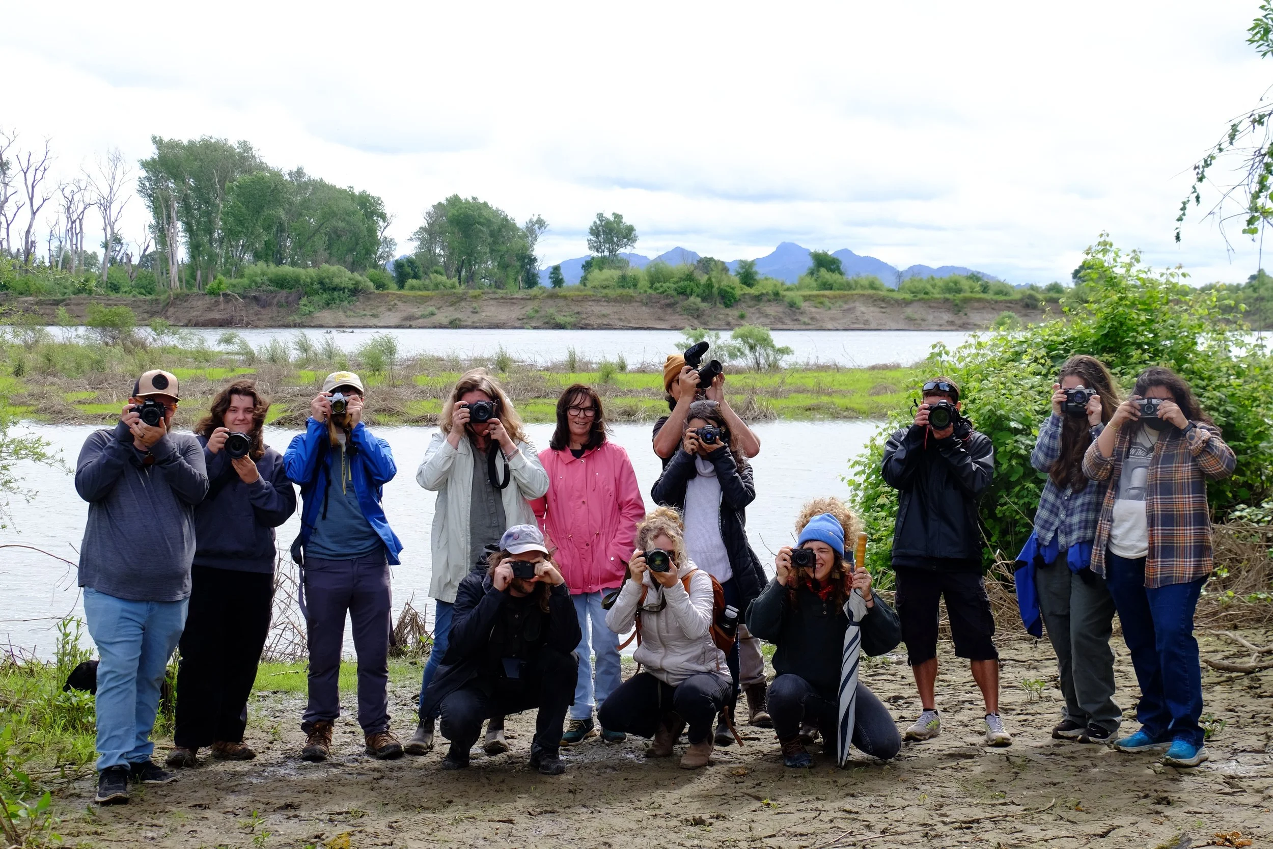 A group of local photographers pose for a photo in Colusa, California, as part of In the County
