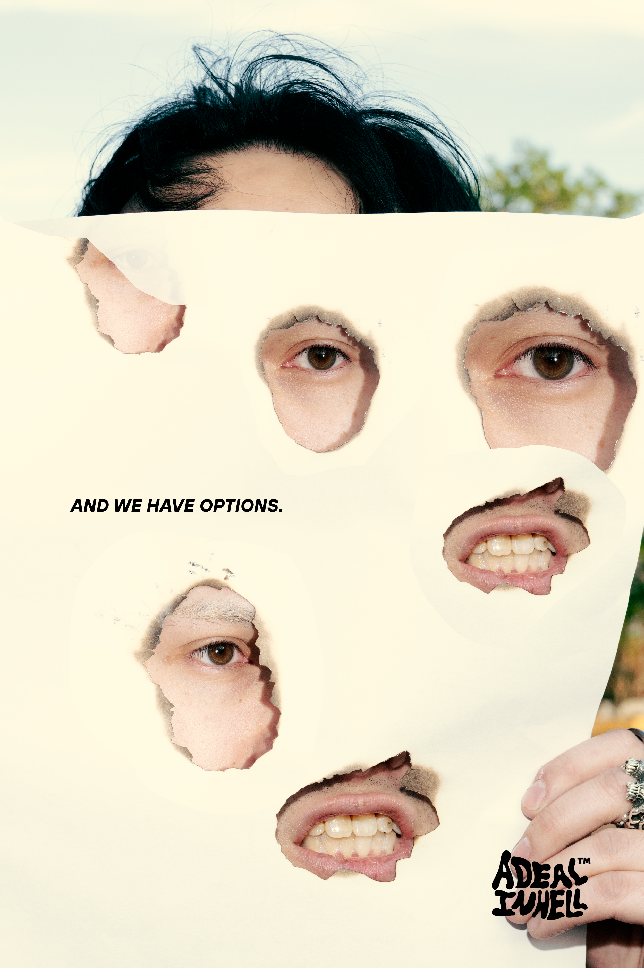 Person holding a torn piece of paper with cutouts of eyes and mouth, revealing their face behind, with the text 'AND WE HAVE OPTIONS.'