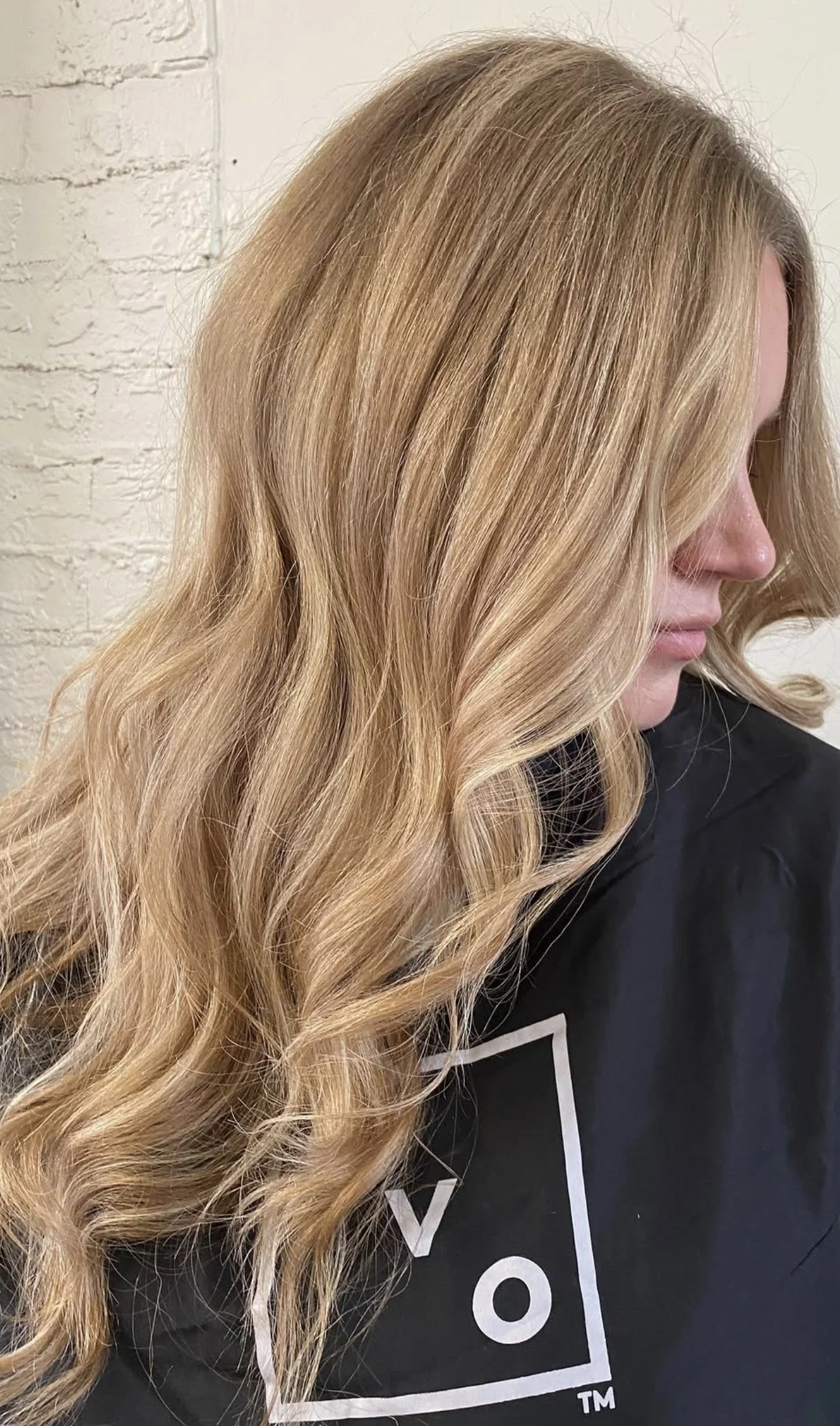 Golden blonde lived-in color with soft waves, low-toxic hair color at Rustic Ritual Beauty in Asheville, NC