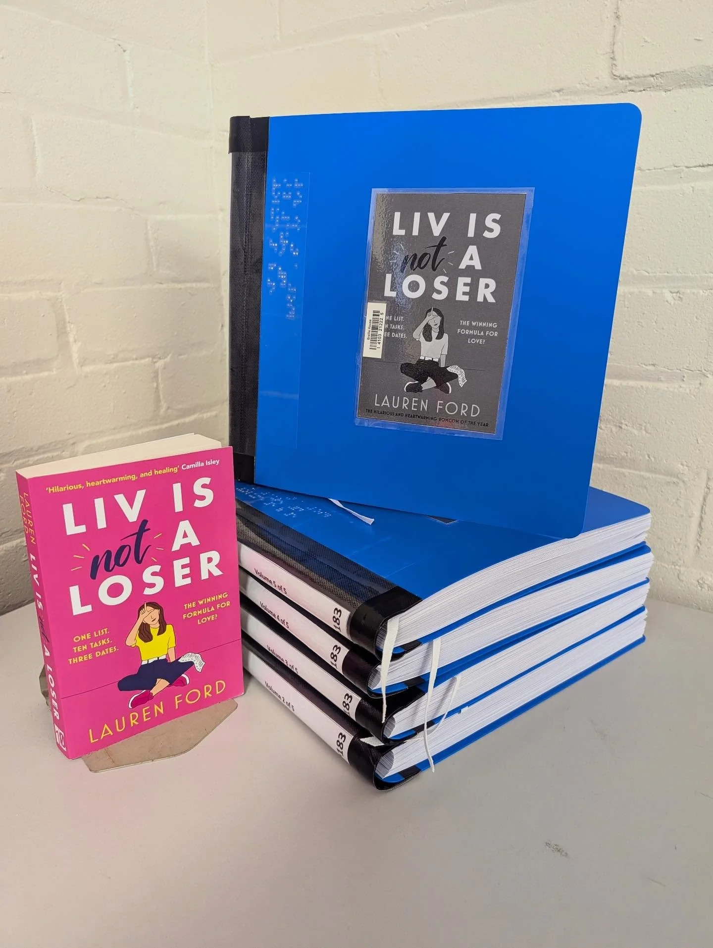 Liv is Not a Loser is now available in the Braille House library! I made the trip over today to see the transcribed novel. The final product is so impressive, especially knowing the number of hours of work from volunteers that went into creating it.