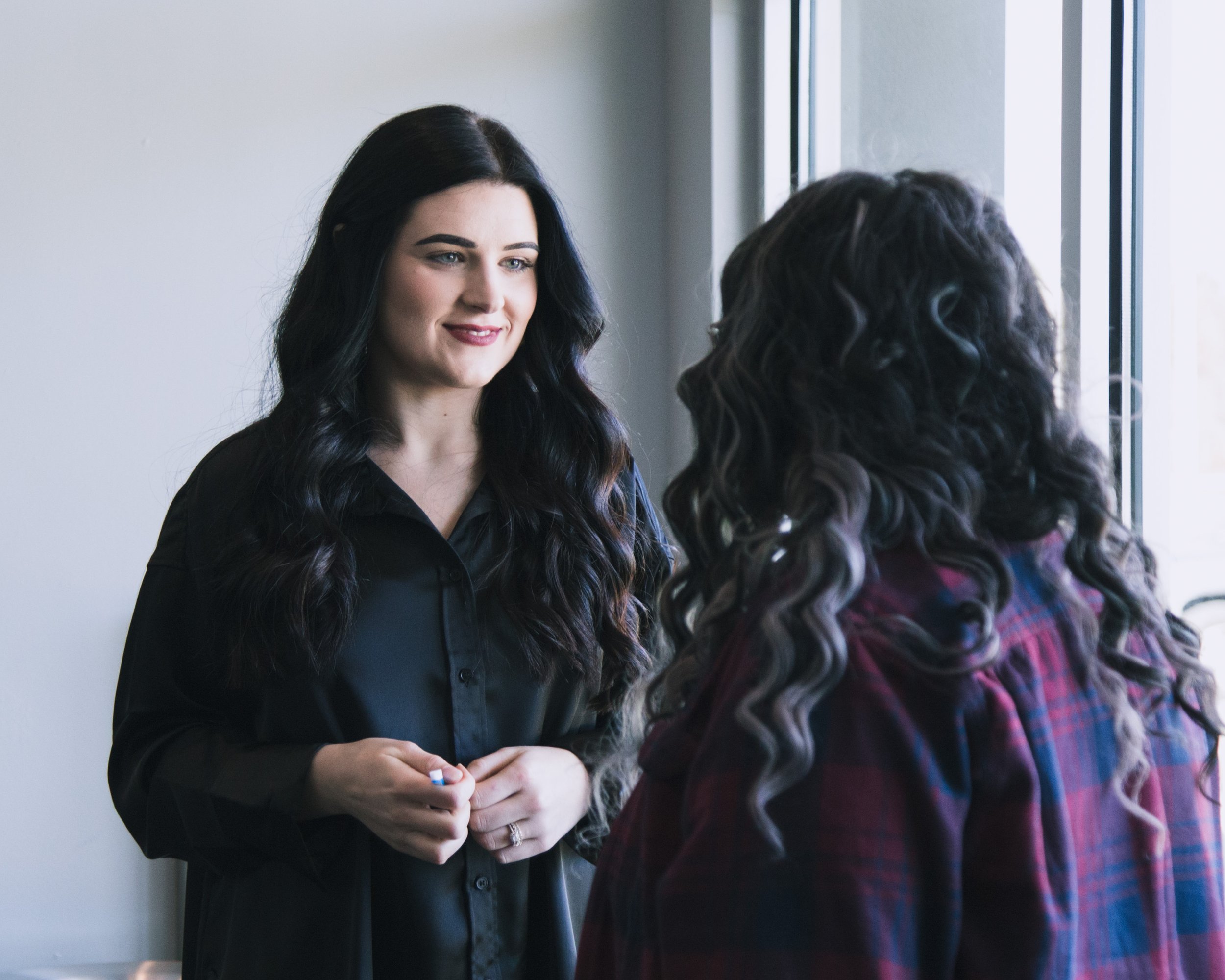  woman listening to another woman at church 